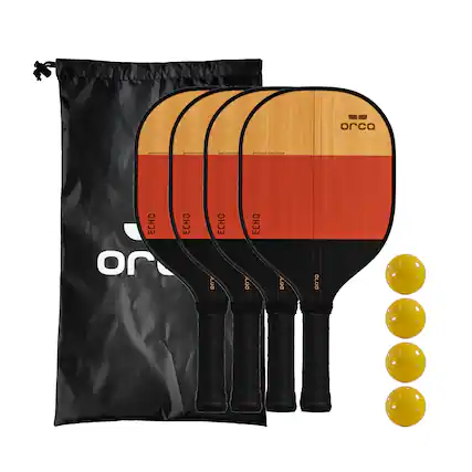 The image features a set of five tennis rackets, each with a different color and design. They are arranged in a row, with one racket on the left, two in the middle, and two on the right. The rackets are placed next to a bag, which is likely used for carrying them. Additionally, there are three tennis balls scattered around the rackets, indicating that they are ready for use.