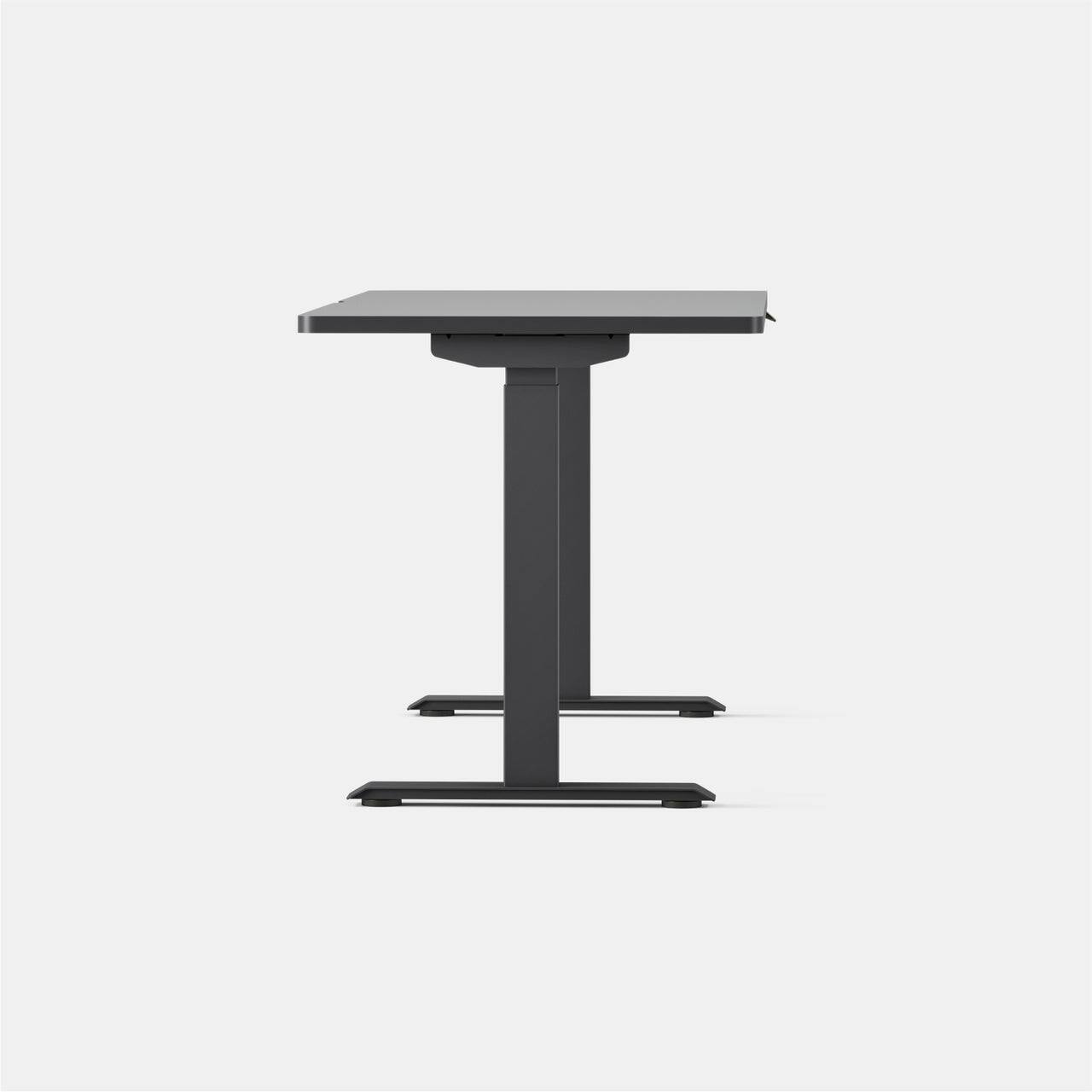 Left. Branch Furniture - Duo Standing Desk 58" – Adjustable Desk with OLED Control Panel, Frameless Design & Compact Footprint - Charcoal / Charcoal.