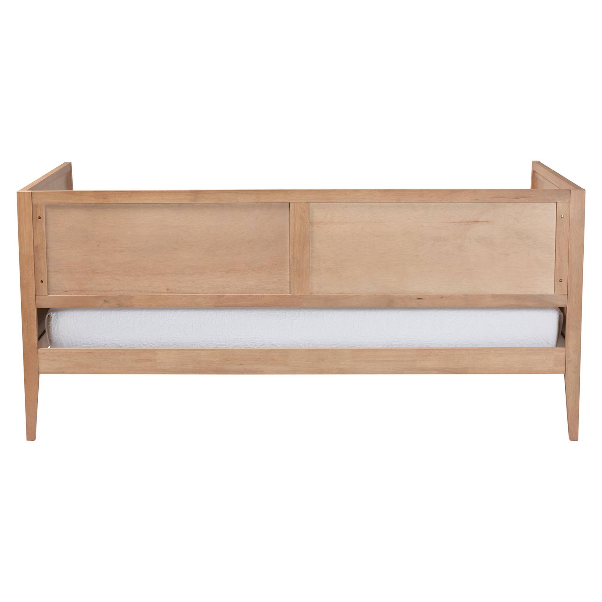 Left. Baxton Studio - Lara Twin Daybed - Modern Wood Bed Frame with Wraparound Laser-Cut Decorative Headboard Overlay - Oak Brown.