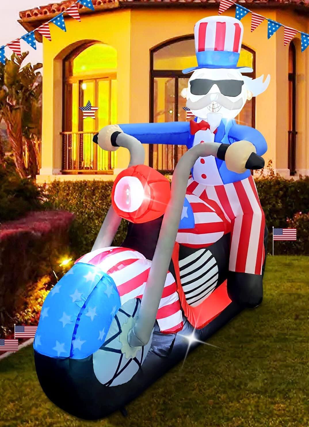 Left. GOOSH Inflatables - GOOSH 6FT Patriotic Independence Day Inflatable Uncle Sam Sitting on Motorcycle with LED Lights - Blue.