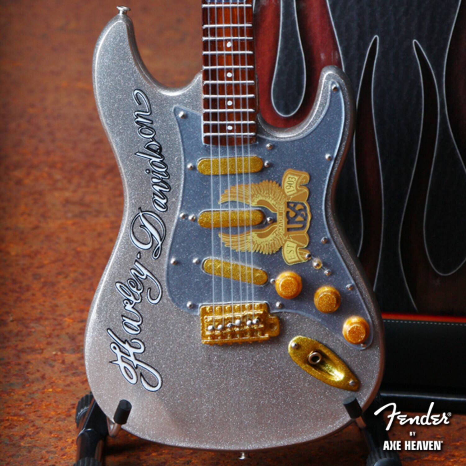 The text on the image should be grouped and corrected as follows:

- "Hollow Body"
- "Fender"
- "USA 1953"
- "Axe Heaven"

The corrected text from the provided text is:

- "Hollow Body"
- "Fender"
- "USA 1953"
- "Axe Heaven"