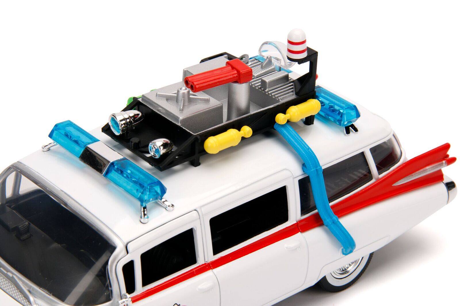 Left. Jada - 1959 Cadillac Ambulance Ecto-1 White "Ghostbusters" Movie "Hollywood Rides" Series 1/24 Diecast Model Car by Jada - White.