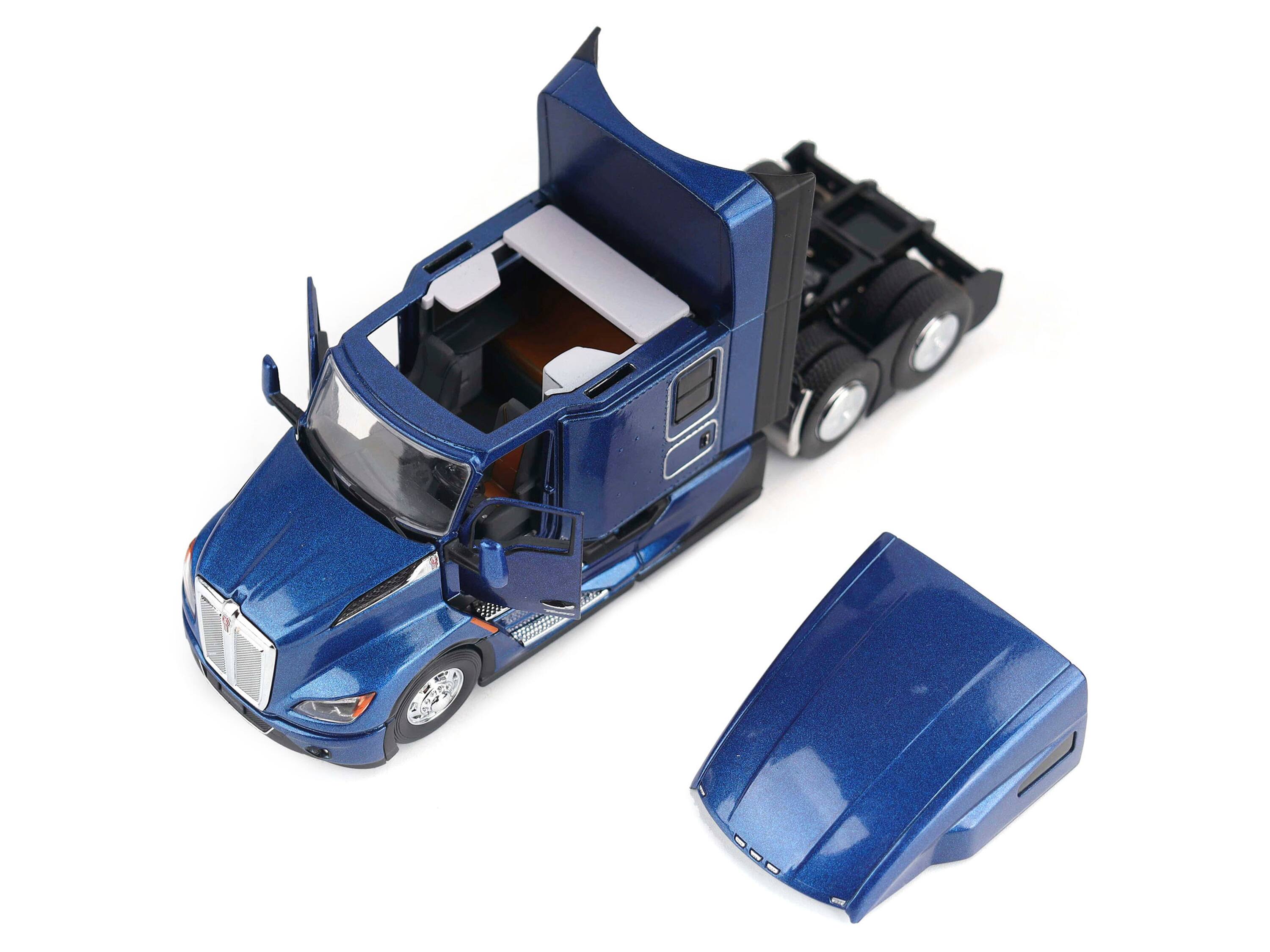 Left. Diecast Masters - Kenworth T680 Truck Tractor Deep Cerulean Blue Metallic "Transport Series" 1/50 Diecast Model by Diecast Masters - Metallic  Blue.