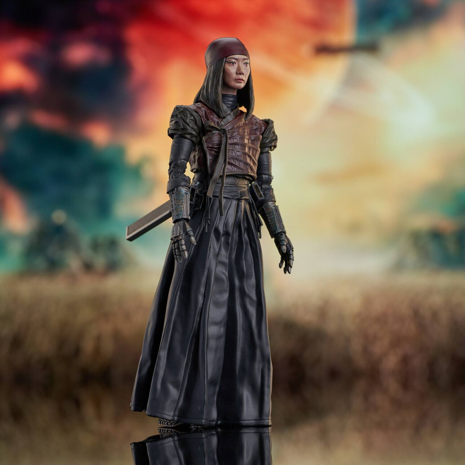 The text "TOKK JUCS" appears to be a misinterpretation or a distorted version of the word "Tokkju," which is a type of Korean liquor. However, there is no visible text in the image provided. The image shows a person dressed in a dark, medieval-style outfit with a sword.