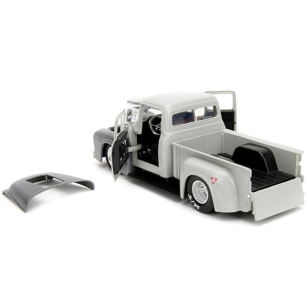 Back. Jada - 1956 Ford F-100 Tan/Gray Metallic w/ Guile Figure – Street Fighter Video Game Anime Hollywood Rides 1/24 - Tan and Gray Metallic.