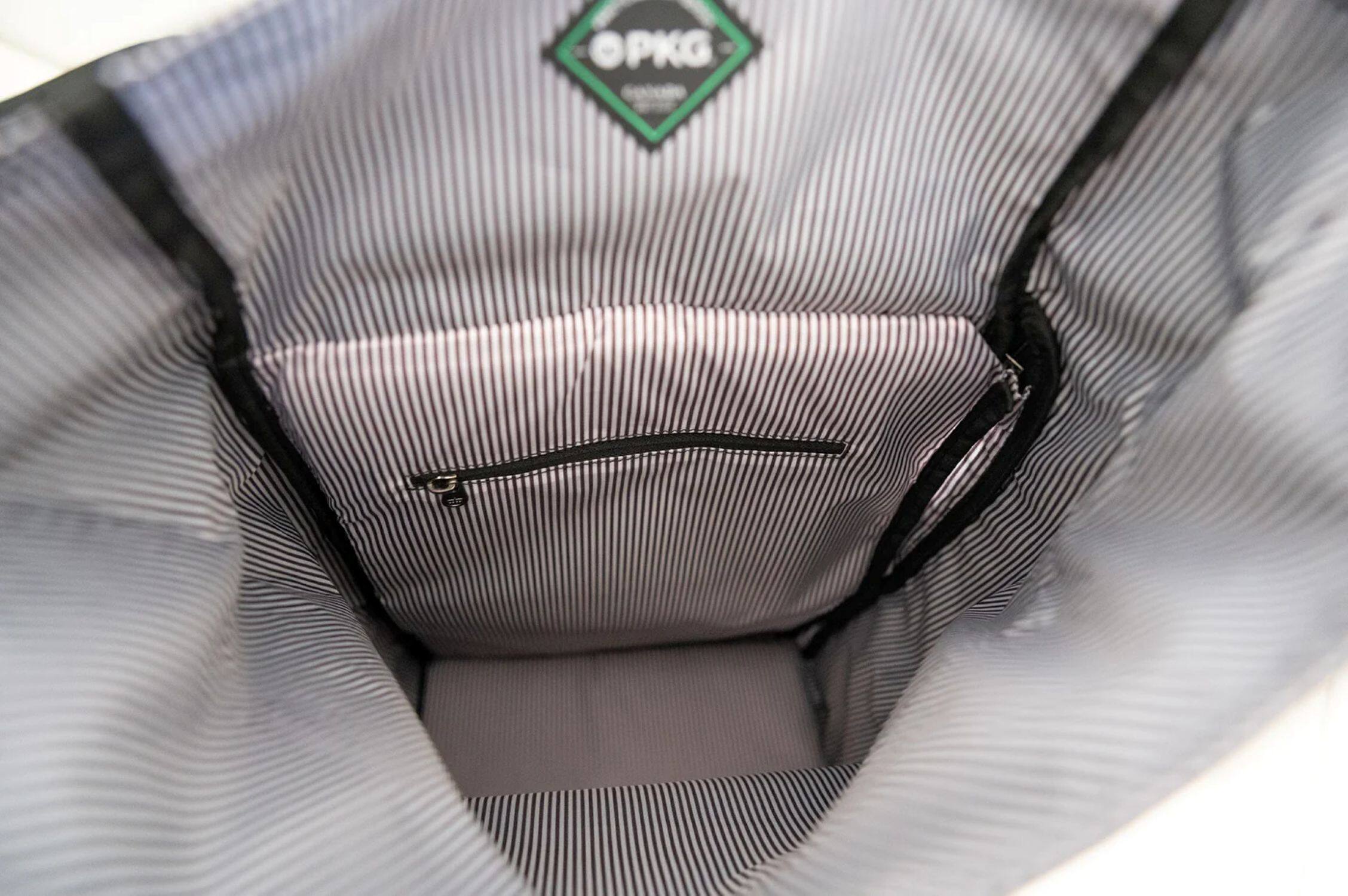 Alt View 1. PKG - Dawson Recycled Roll Top Backpack - Black.