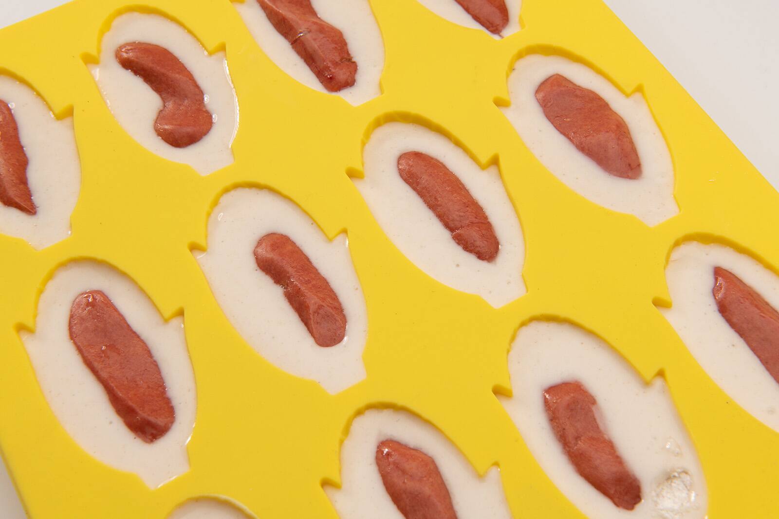 Alt View 3. MOBI - 12 Pigs in a Blanket Silicone Snack Mold, Mini Corn Dogs - Yellow.