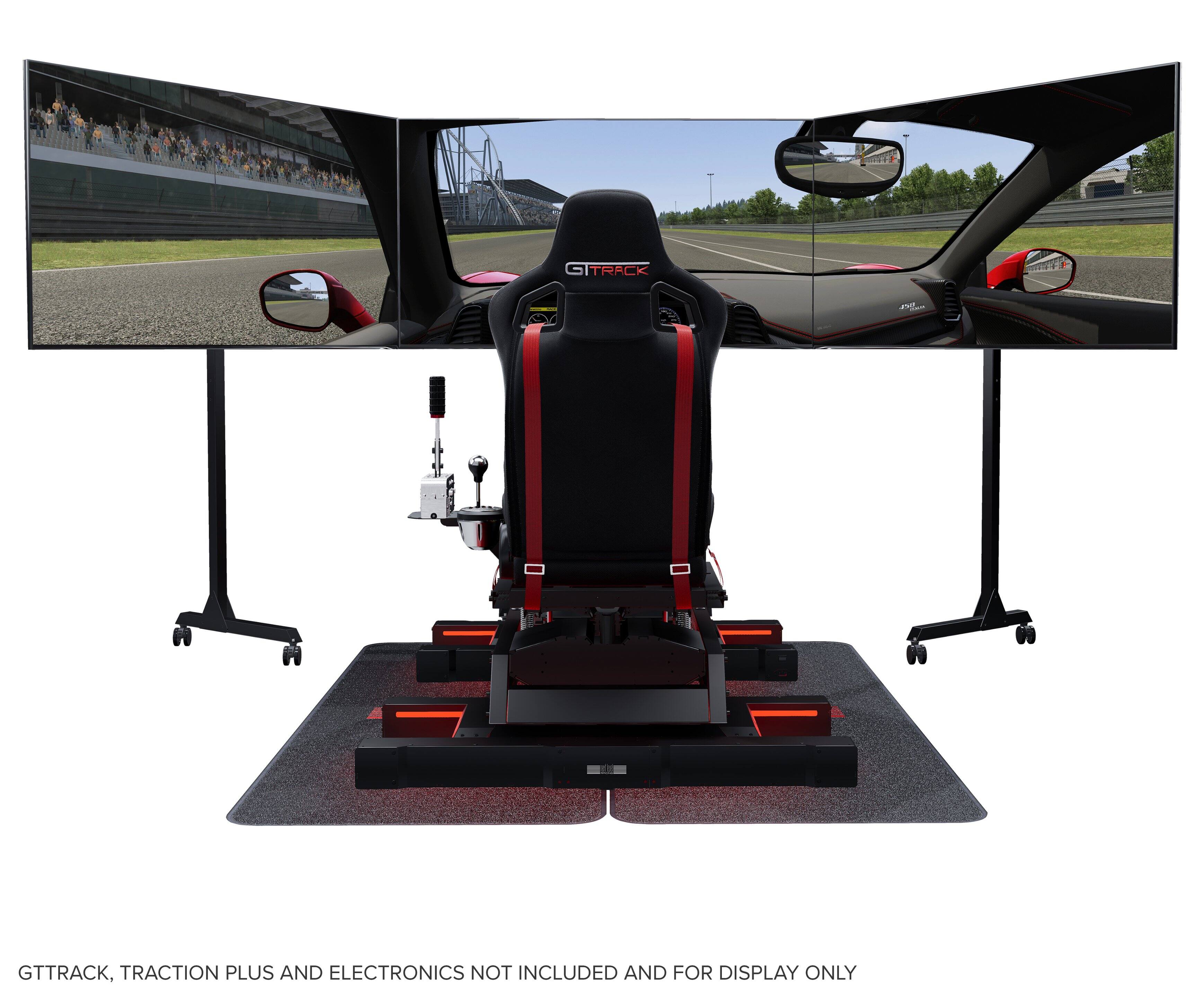 The image features a racing simulator with a seat and steering wheel. The simulator is designed for display purposes only and does not include GTTrack, Traction Plus, and Electronics.