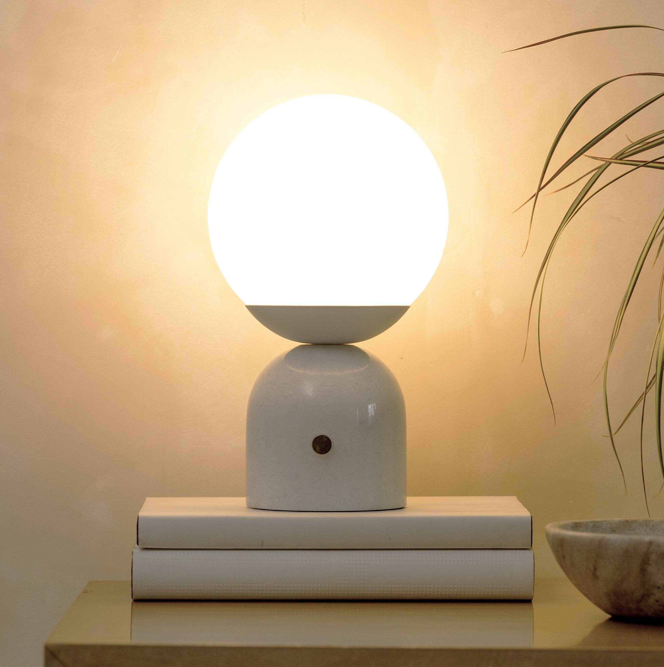 Angle. Brightech - Mila LED Modern Contemporary Round Globe Dimmable Bedside Nightstand Desk Lamp with Frosted White Glass Shade - Glossy White Marble.