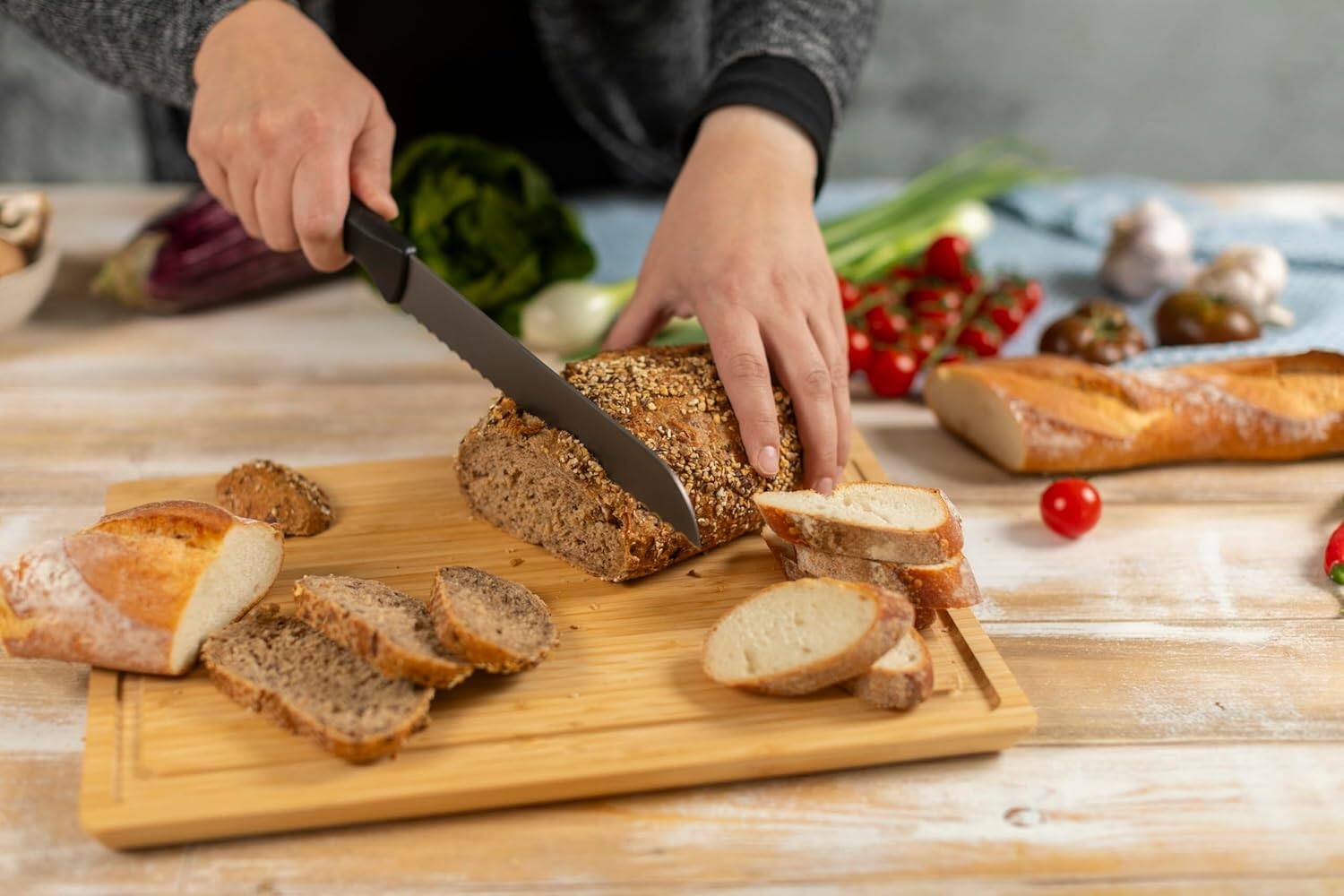 Alt View 1. Kuhn Rikon - ICED Bread Knife 7.87-Inch, Ice Hardened German Stainless Blade - Black.