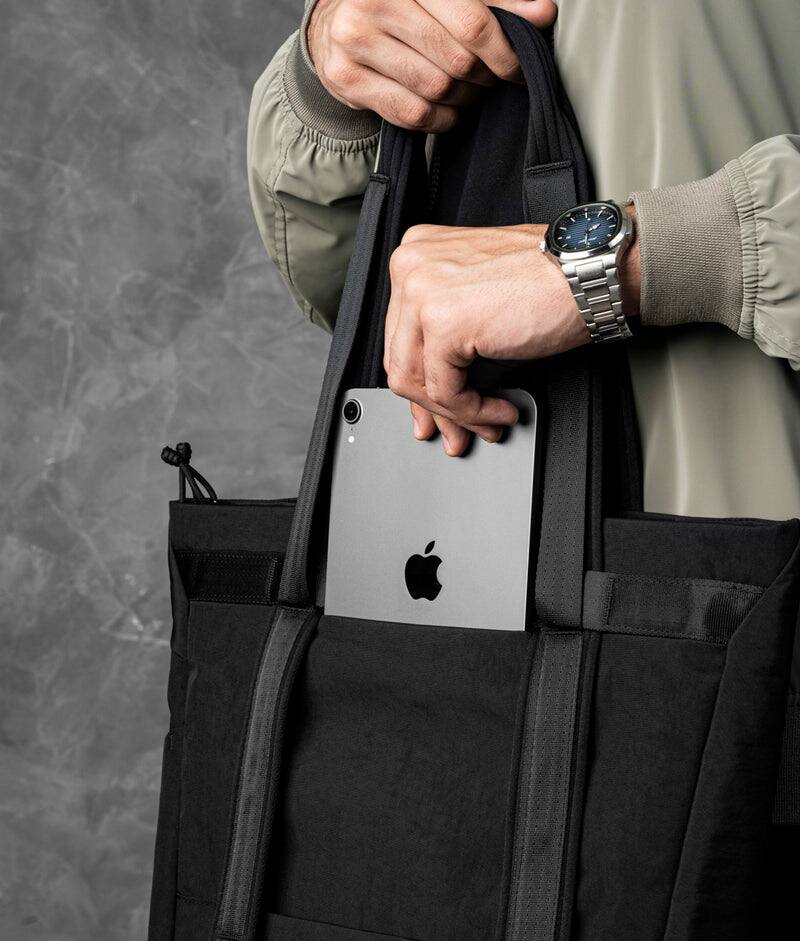 Alt View 1. ALPAKA - Flow Totepack Laptop Backpack for Men, 16" Laptop Compartment + 11" Tablet Sleeve, Tote/Backpack, Bottle Pocket - Black Axoflux 400D Washed Nylon.
