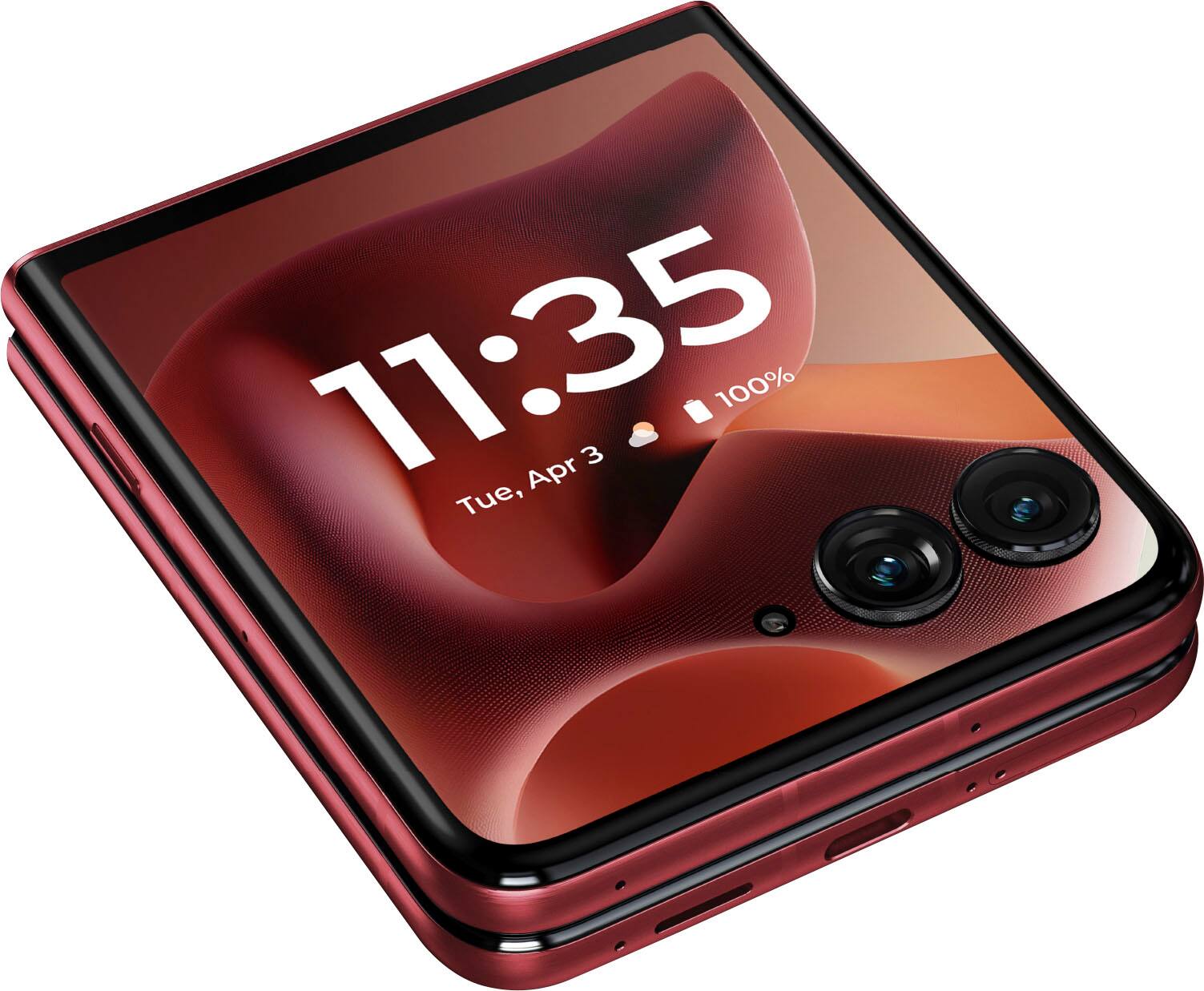 The image shows a red cell phone with a screen displaying the time as 11:35. The phone is turned on and ready to use. The image also shows the date, which is Tuesday, April 3rd. The phone is 100% charged, indicating that it is fully functional and ready for use.