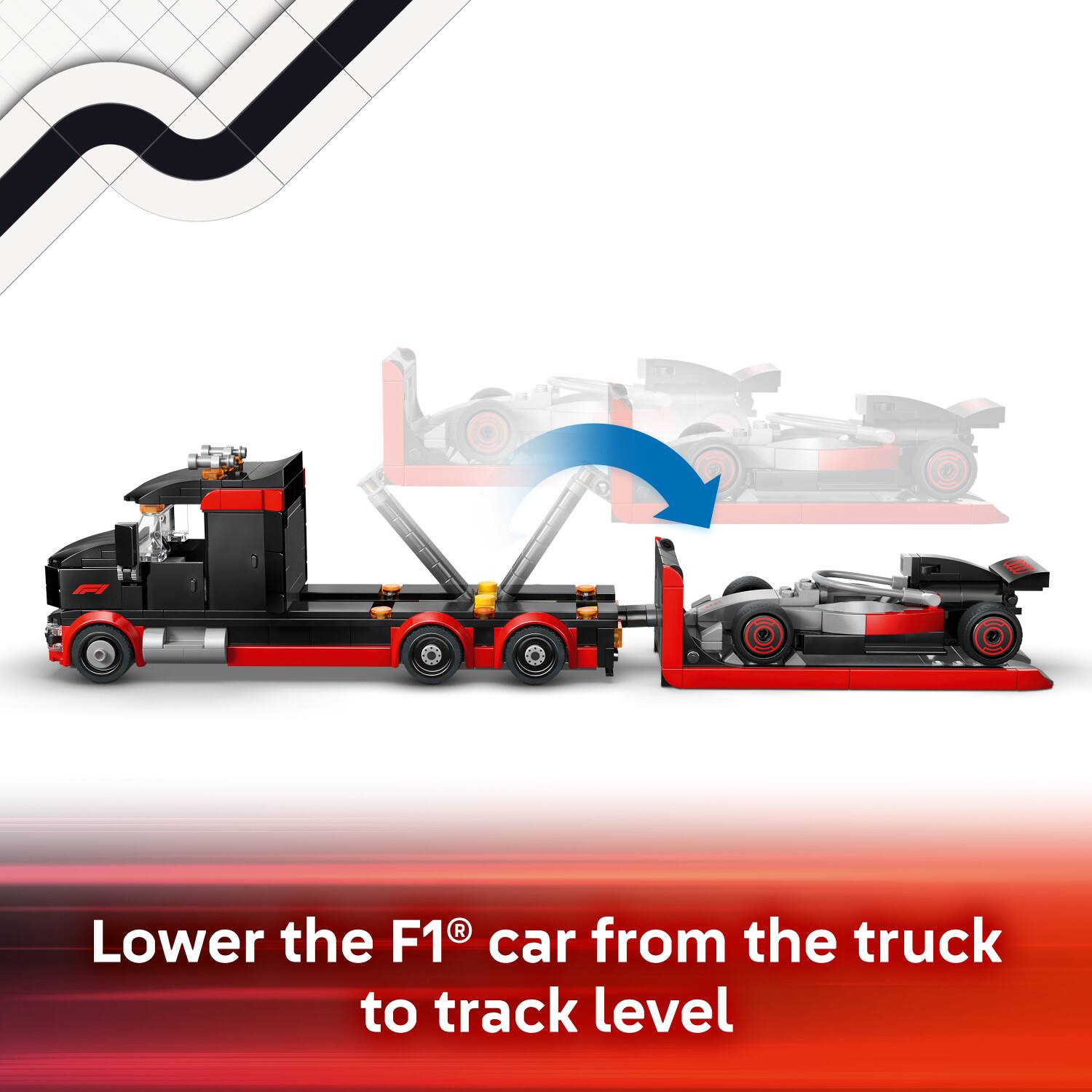 Lower the F1® car from the truck to track level