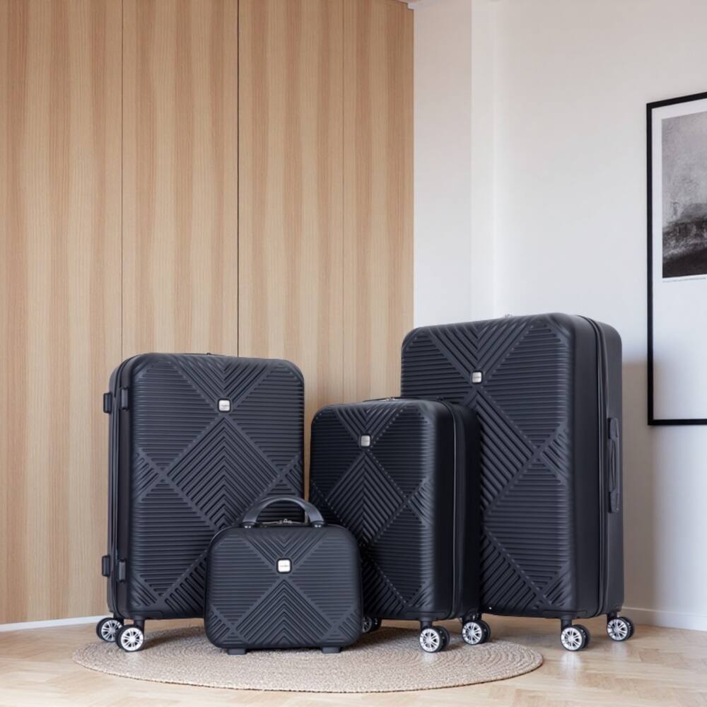 Angle. BreeBe - 4-Piece ABS Lightweight Suitcase Set with Makeup Box and Aircraft Wheels - Black.