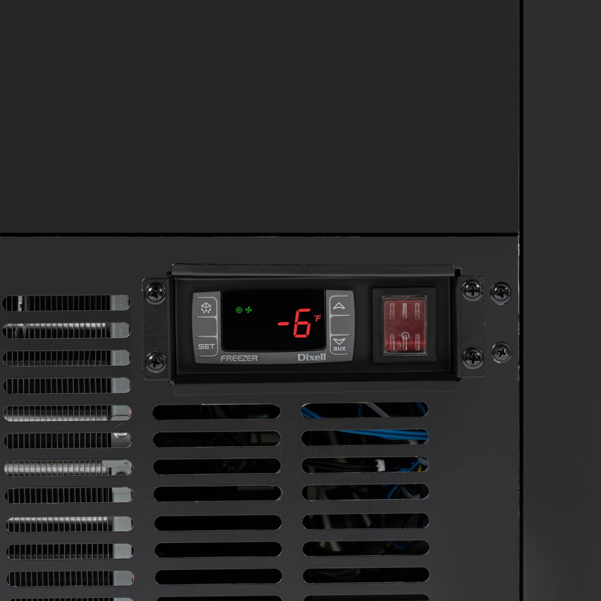 The text on the image reads "F - -6 SET aux FREEZER Dixell." This text is likely related to a temperature control system, with the "F" indicating the temperature in Fahrenheit, the "-" symbol indicating a negative value, and the "6" representing the temperature in degrees. The "SET" and "aux" refer to the auxiliary settings for the freezer, while "Dixell" could be the brand or model of the temperature control system.