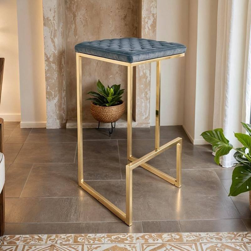 Angle. LeisureMod - Quincy Modern Quilted Leather Bar Stool with Gold Metal Frame Counter Height Chair for Kitchen and Counter Seating - Peacock Blue.