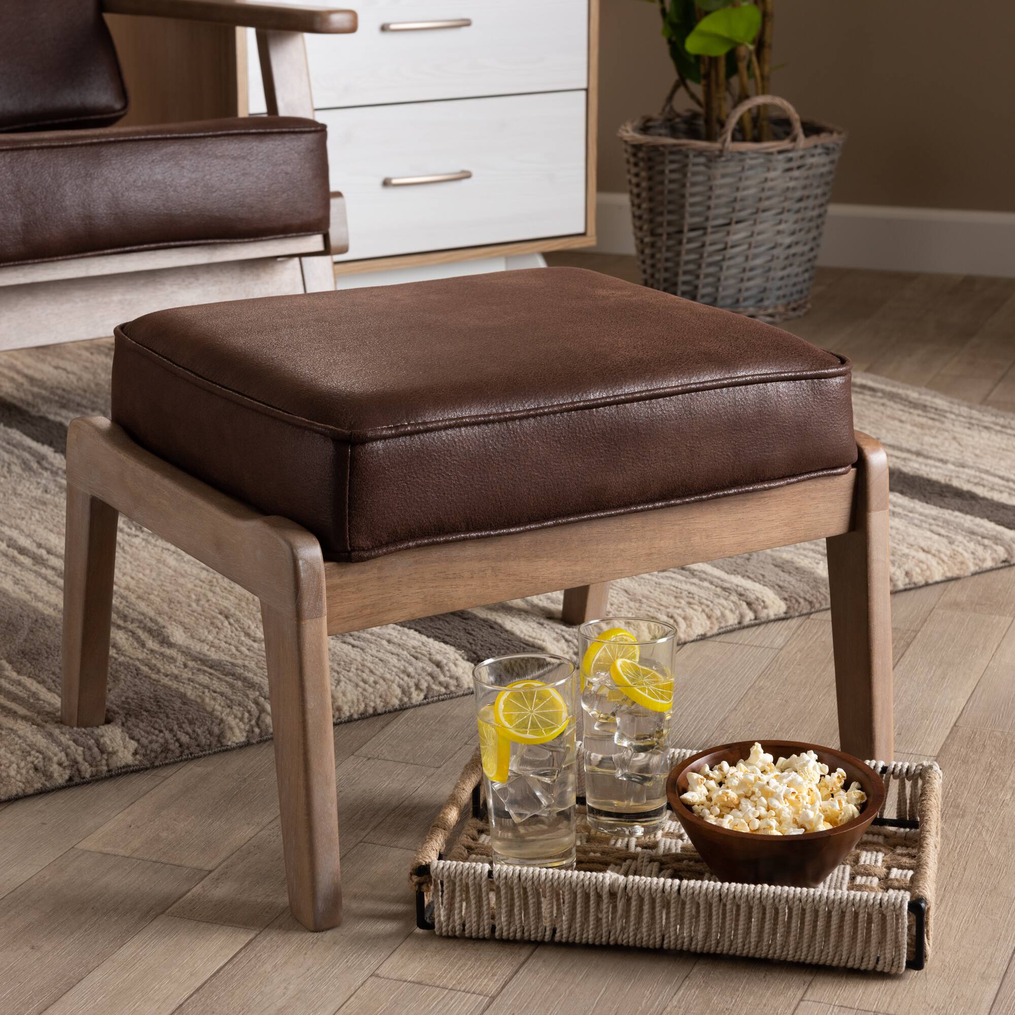 Alt View 1. Baxton Studio - Sigrid Mid-Century Modern Faux Leather Effect Fabric Upholstered Antique Oak Finished Wood Ottoman - Dark Brown/Antique Oak.