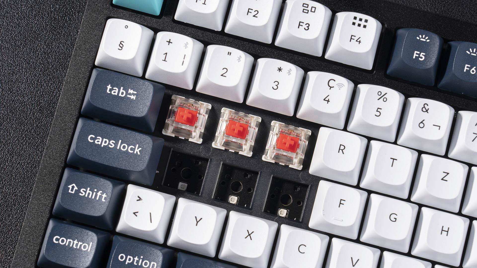 The text on the image reads:

tab, caps lock, shift, control, option, F2, F3, F4, F5, F6, F7, F8, F9, F10, F11, F12, I, O, P, J, K, L, M, N, U, O, P, J, K, L, M, N, U, O, P, J, K, L, M, N, U, O, P, J, K, L, M, N, U, O, P, J, K, L, M, N, U, O, P, J, K, L, M, N, U, O, P, J, K, L, M, N, U, O, P, J, K, L, M, N, U, O, P, J, K, L, M, N, U, O, P, J, K, L, M, N, U, O, P, J, K, L, M, N, U, O, P, J, K, L, M, N, U, O, P, J, K, L, M, N, U, O, P, J, K, L, M, N, U, O, P, J, K, L, M, N, U, O, P, J, K, L, M, N, U, O, P, J, K, L, M, N, U, O, P, J, K, L, M, N, U, O, P, J, K, L, M, N, U, O, P, J, K, L, M, N, U, O, P, J, K, L, M, N, U, O, P, J, K, L, M, N, U, O, P, J, K, L, M, N, U, O, P, J, K, L, M, N, U, O, P, J, K, L, M, N, U, O, P, J, K, L, M, N, U, O, P, J, K, L, M, N, U, O, P, J, K, L, M, N, U, O, P, J,