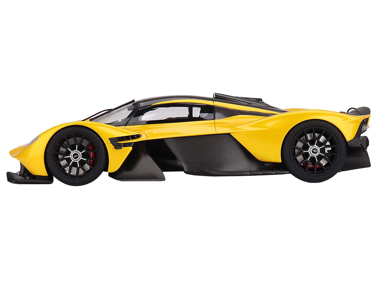 Left. Top Speed - Aston Martin Valkyrie Cosmopolitan Yellow Metallic and Carbon 1/18 Model Car by Top Speed - Yellow Metallic.