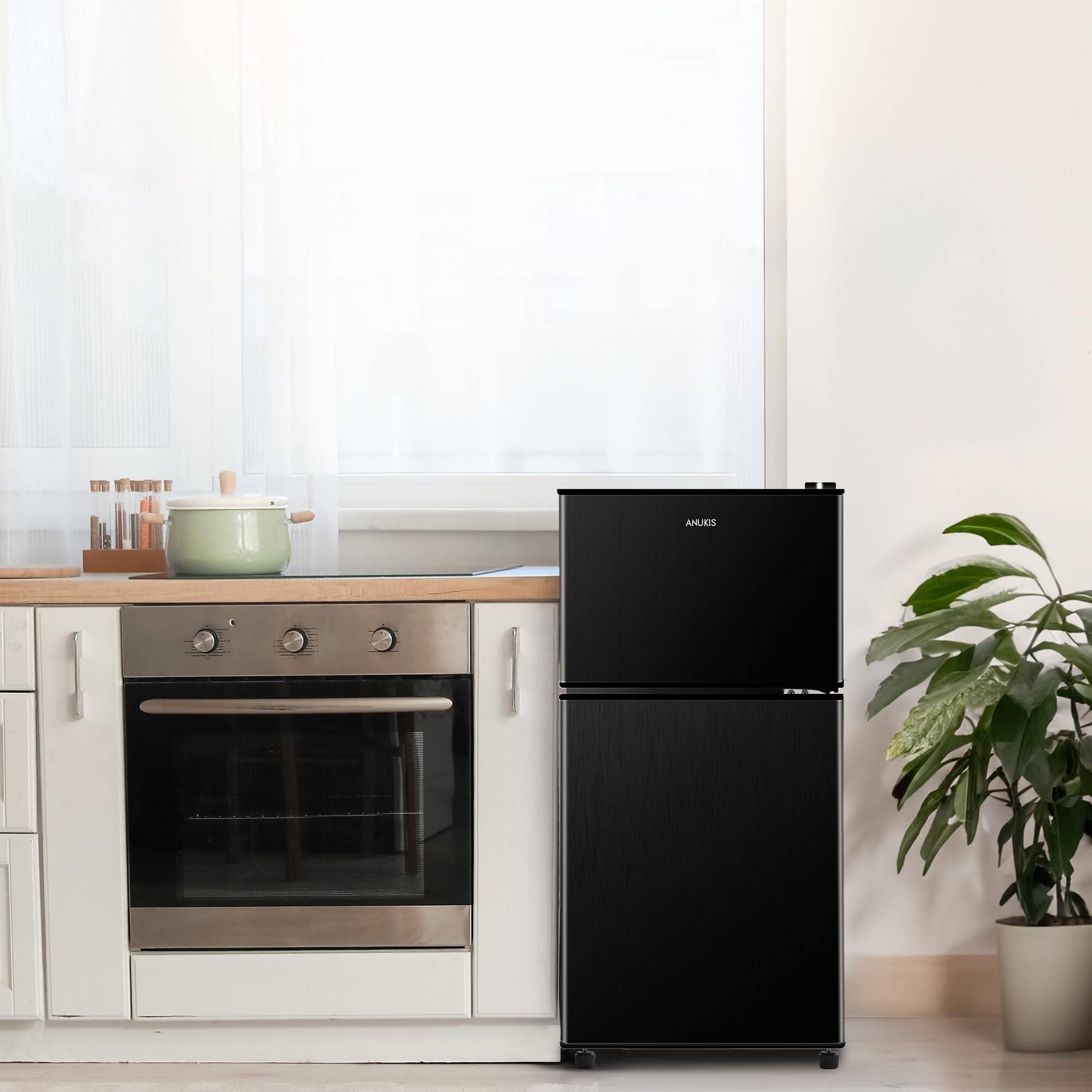 Angle. Aukfa - 3.5Cu.Ft Compact Refrigerator with Freezer - 2 Door, 7 Level Thermostat, Removable Shelves for Kitchen/Dorm/Office - Black.