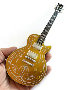 Axe Heaven - ZZ Top - Billy F Gibbons Gibson Standard 1957 Gold Top Pin Stripe Mini Guitar Replica - COLLECTIBLES - Multicolor
