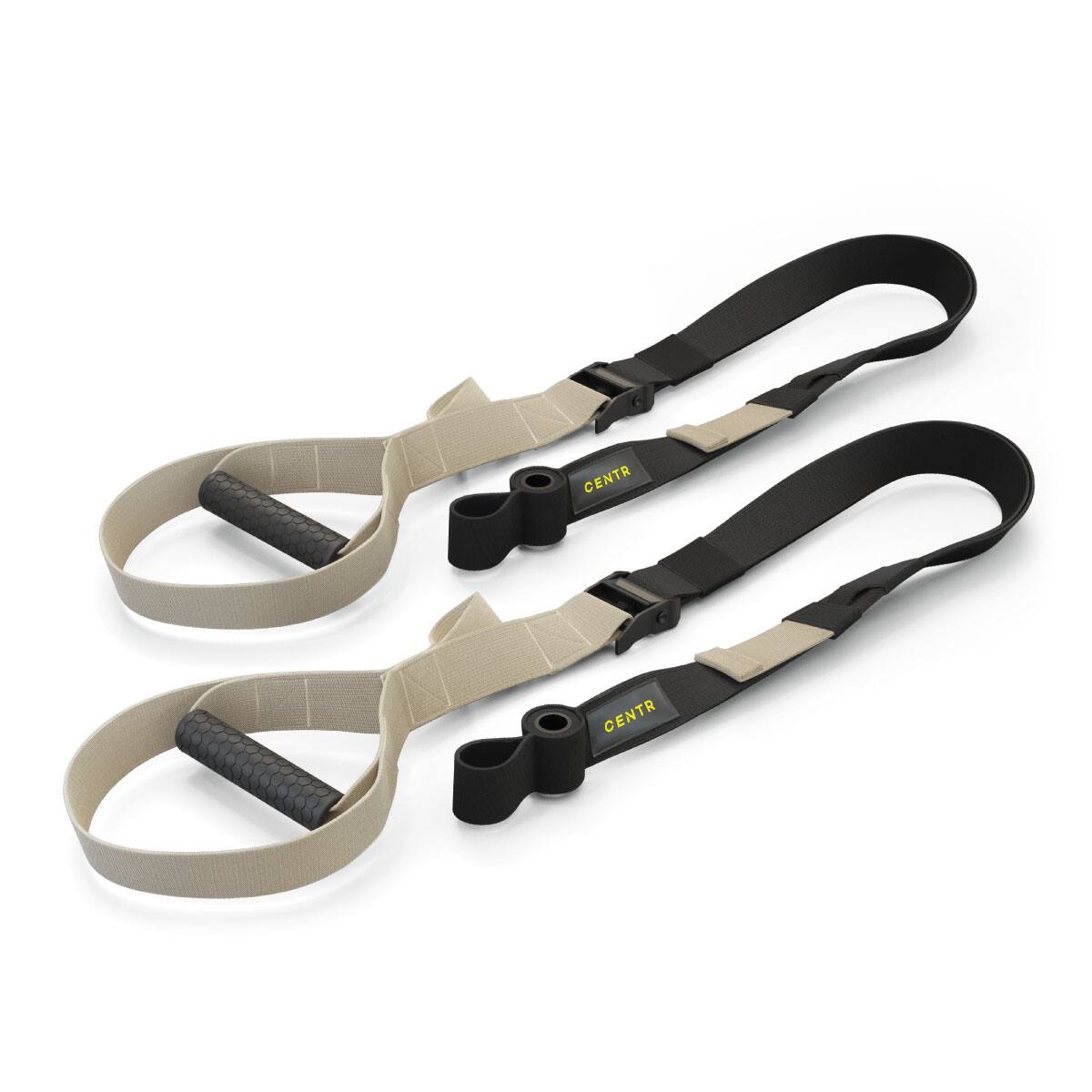The image shows two black and grey straps, which are likely part of a piece of exercise equipment. The straps are positioned next to each other, with one strap being slightly longer than the other. The straps are attached to a piece of equipment that is not visible in the image.