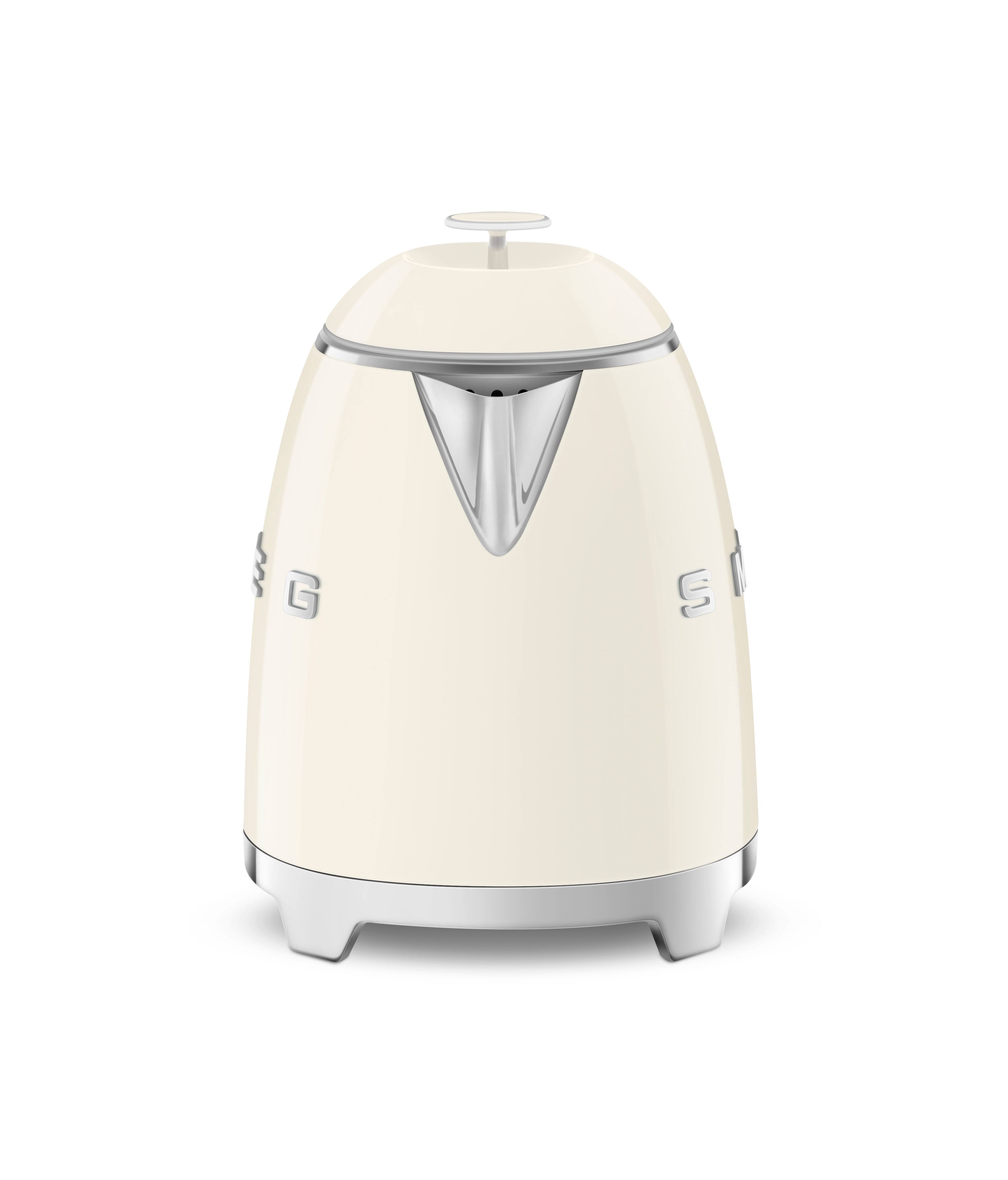 Angle. SMEG - KLF05 3.5-cup Electric Mini Kettle - Cream.