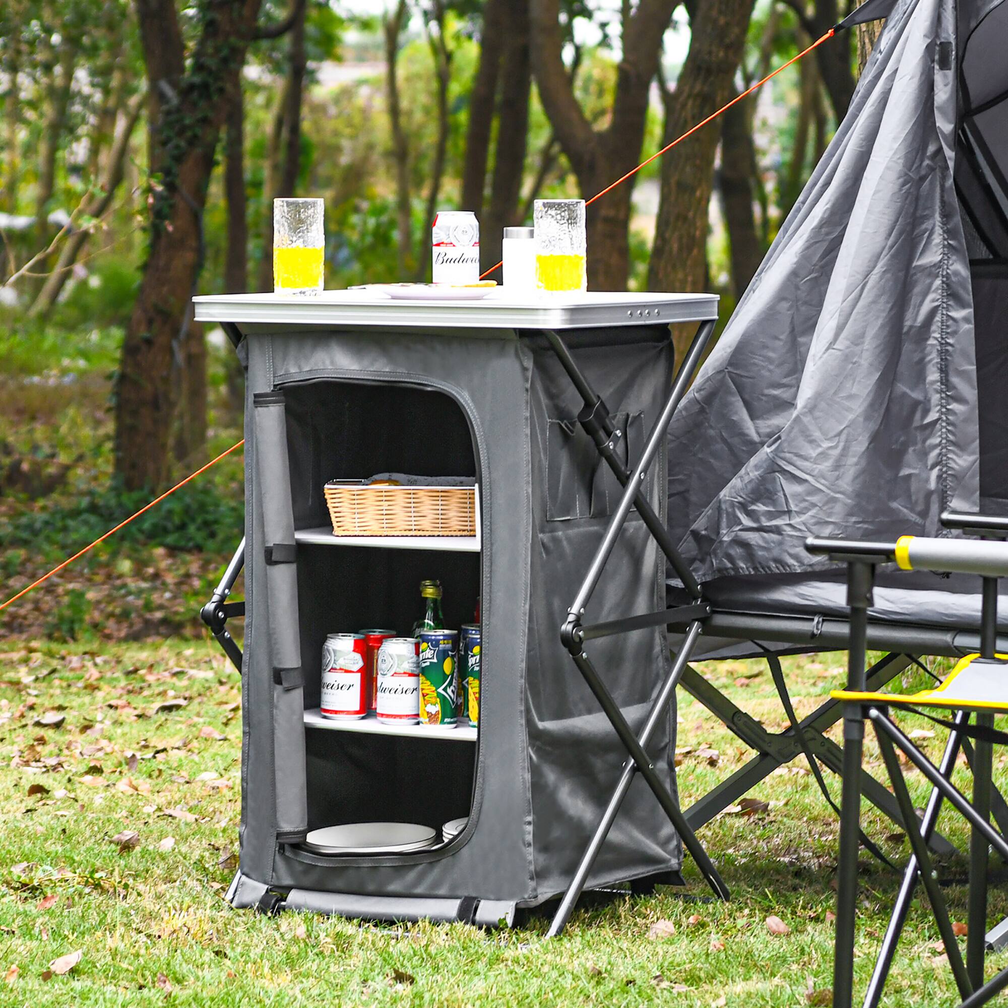 Beer and soda cans are stored in a cooler outside.