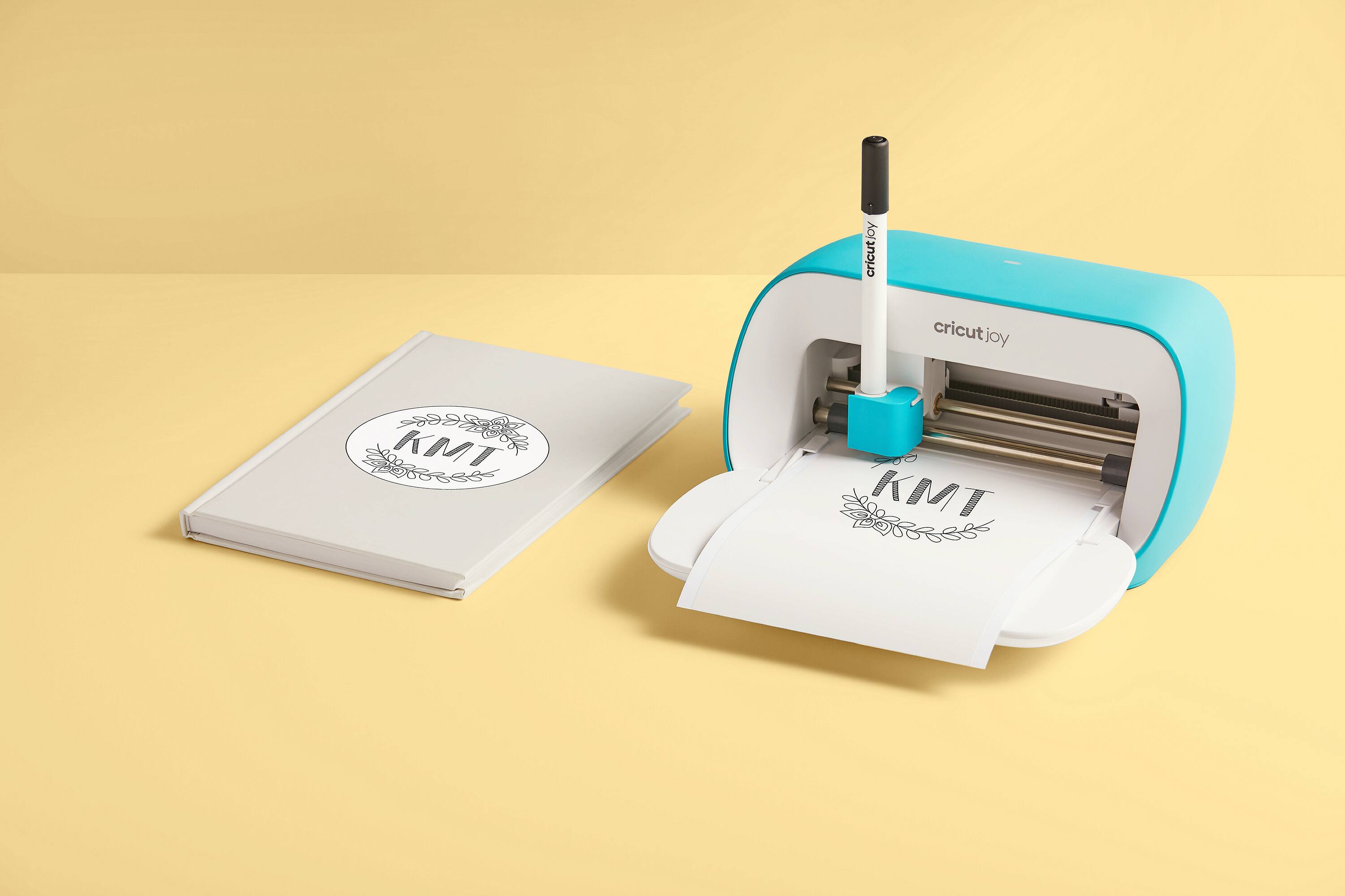 The text on the image reads "cricut joy cricut joy KMT KMT". The correct grouping and correction would be: "Cricut Joy Cricut Joy KMT KMT".