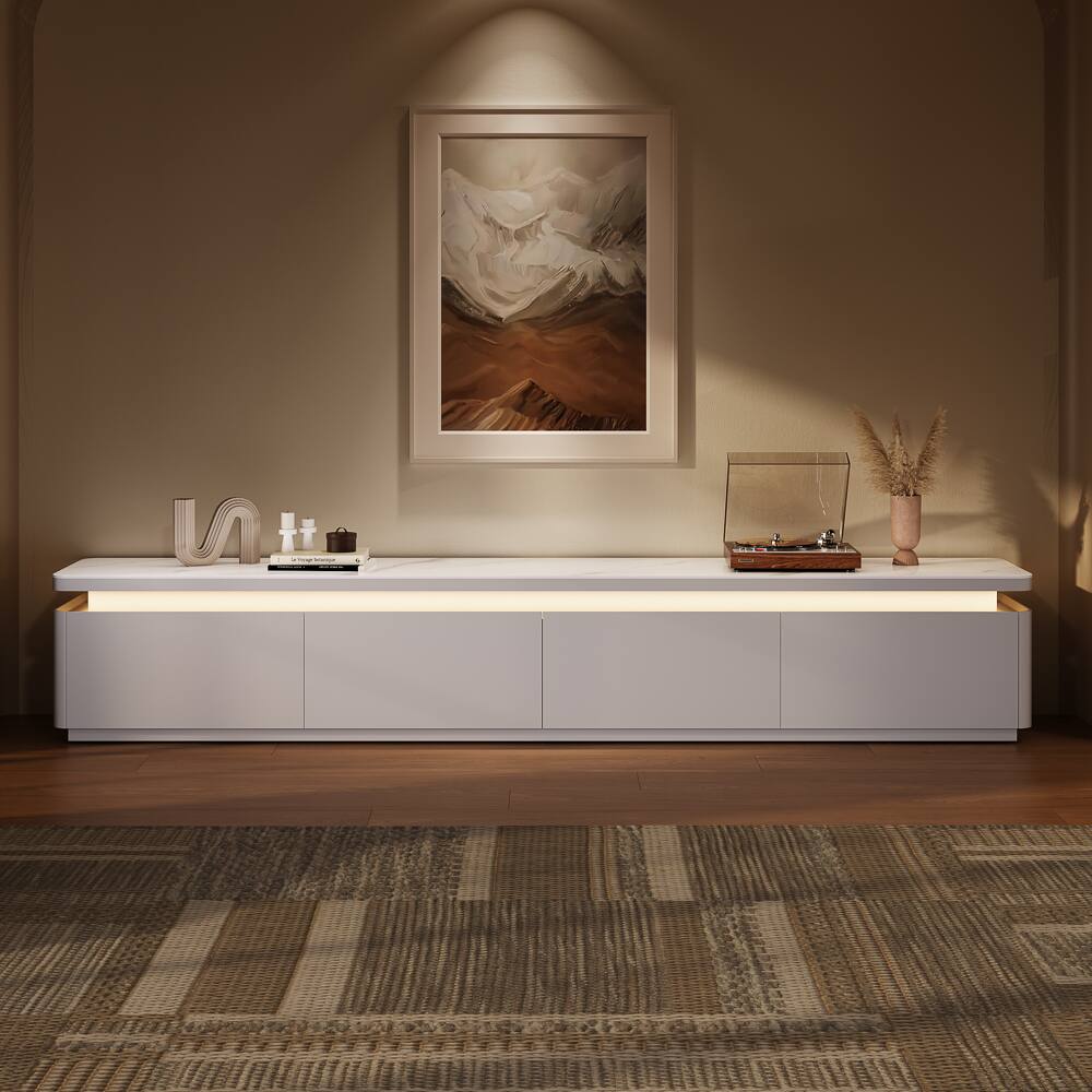 Angle. POVISON - 95" Fully Assembled White Glossy Sintered Stone Mid-Century TV Stand with LED Lights and Drawers for 65 to 75 In TVs - White MDF.