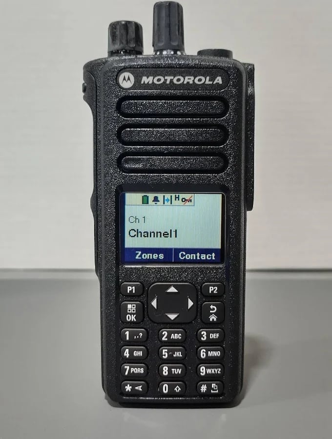 MOTOROLA

Ch 1
Channel1
Zones Contact

P1 P2 OK

1 2 3
4 5 6
7 8 9
0 * #

1: .?
2: ABC
3: DEF
4: GHI
5: JKL
6: MNO
7: PQRS
8: TUV
9: WXYZ