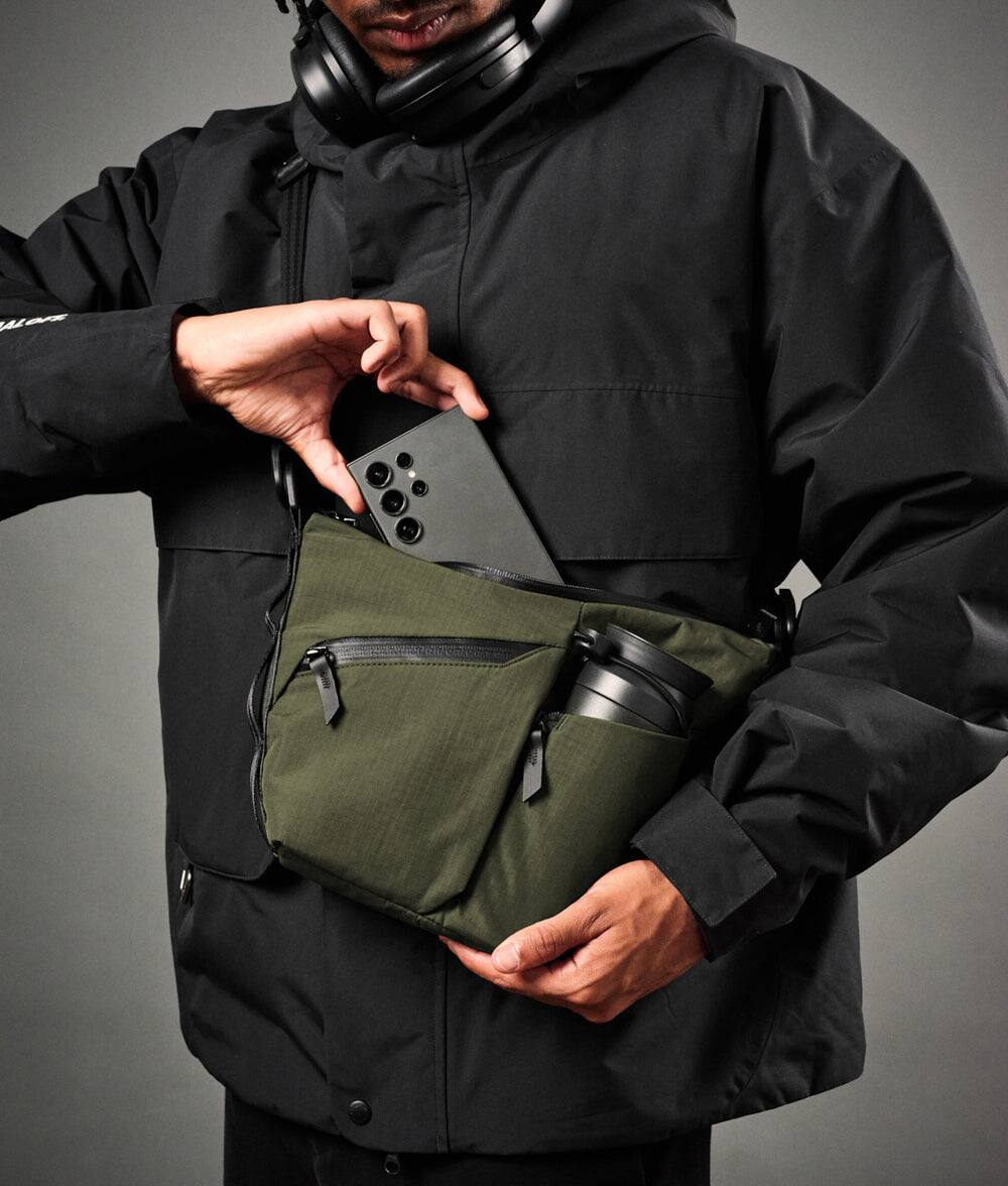 Alt View 1. ALPAKA - Flow Satchel Mini 2L Crossbody Bag, Water Resistant Shoulder Bag, Expandable Bottle Pocket, YKK Zippers - Green Axoflux 210D.