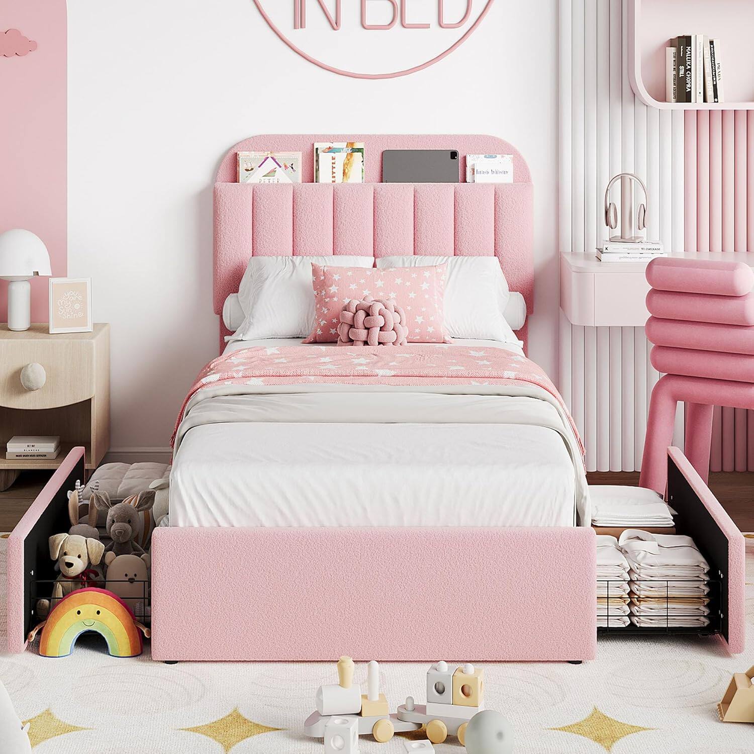 The text in the image reads:

- "IN BLD" (on the wall above the bed)
- "Lena Bloom" (on a card on the nightstand)
- "THE COMPLETE" (on a book on the shelf)
- "THE COMPLETE" (on another book on the shelf)
- "LITTLE MISS" (on a book on the shelf)
- "LITTLE MISS" (on another book on the shelf)