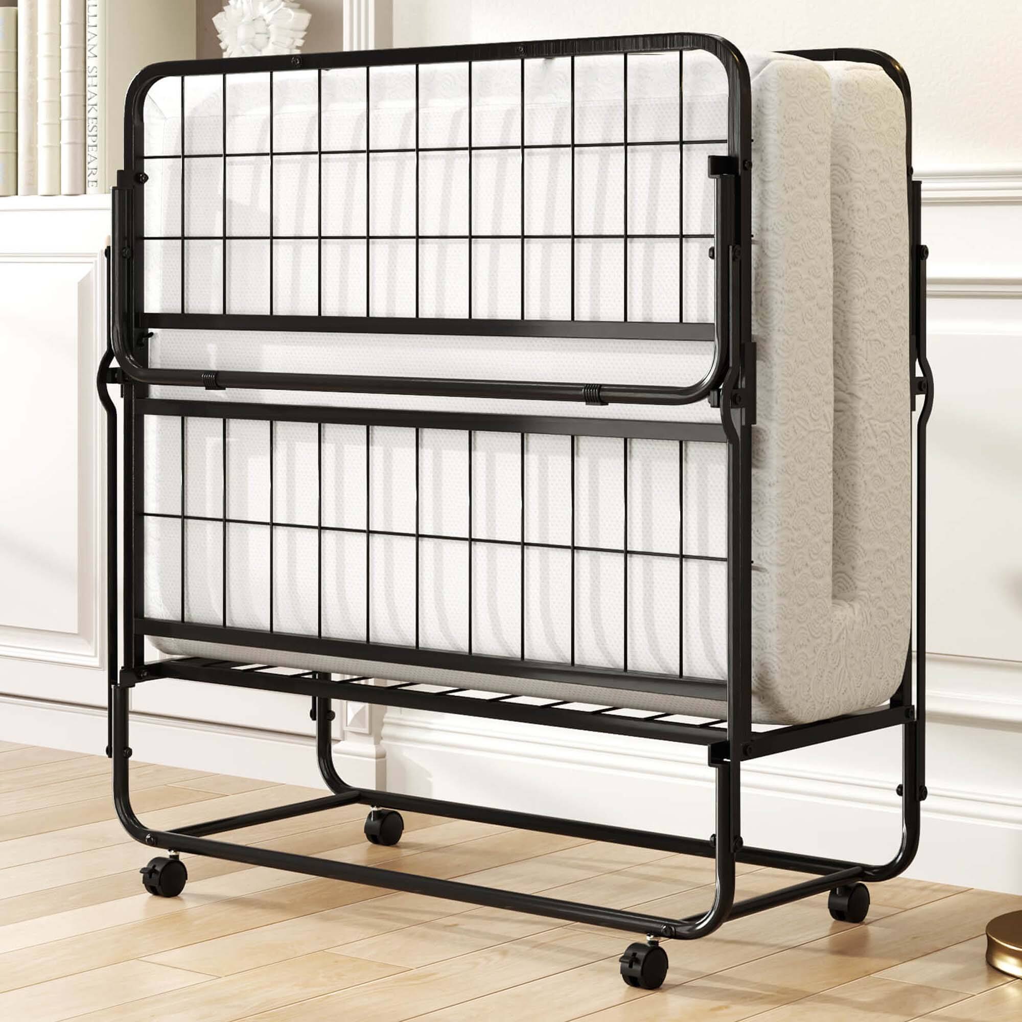 The image shows a metal bed frame with a white mattress on top. The bed frame is black and has a metal headboard. The mattress is placed on top of the bed frame, and it is white. The bed frame is designed to be sturdy and functional, providing support for the mattress and the person sleeping on it. The metal headboard adds an additional element of style and comfort to the bed.