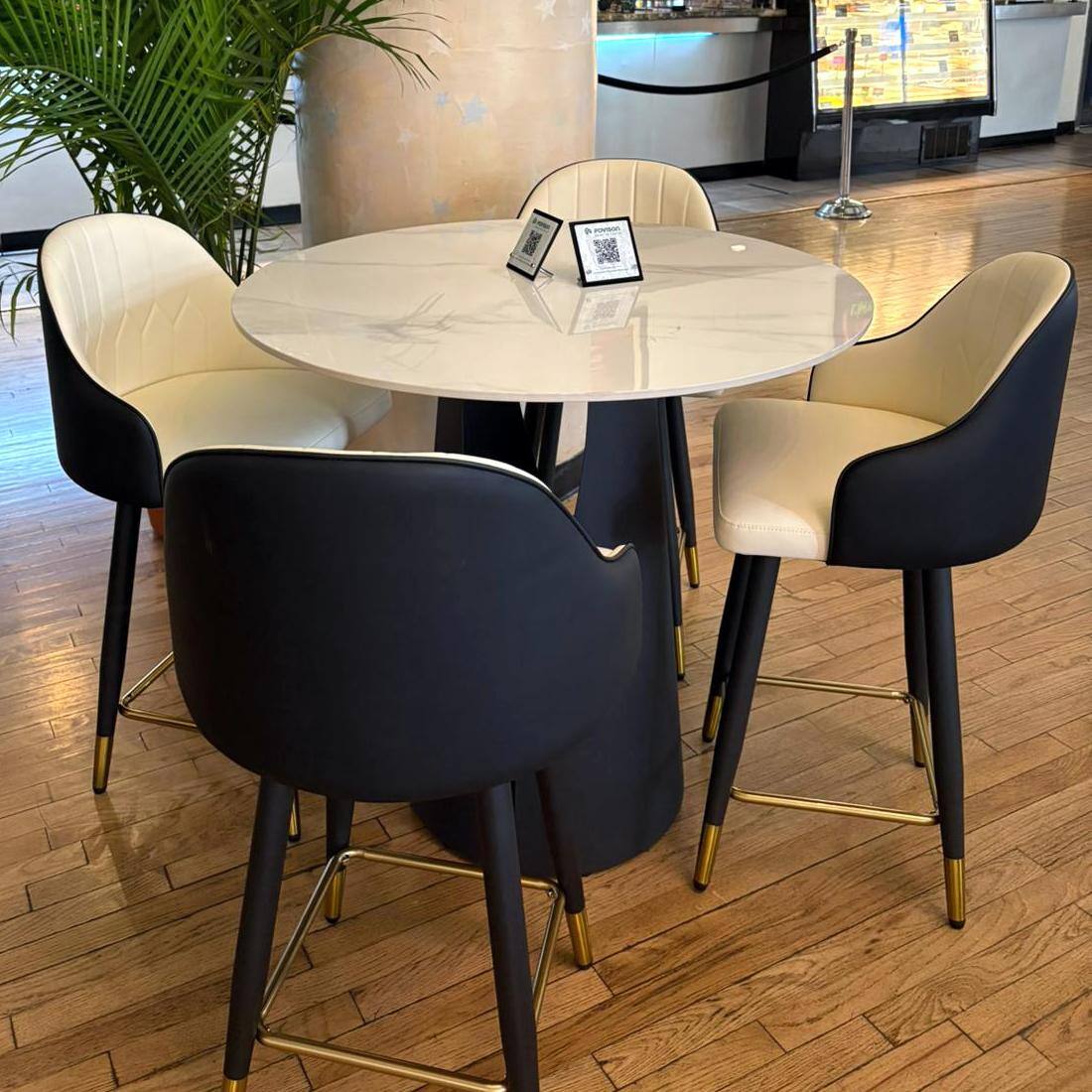 Left. POVISON - 24" Modern Counter Stools Set of 2, Leather Bar Stools with Backs, Upholstered Bar Stools, Beige Bar Stools, Black - Black PU Leather.