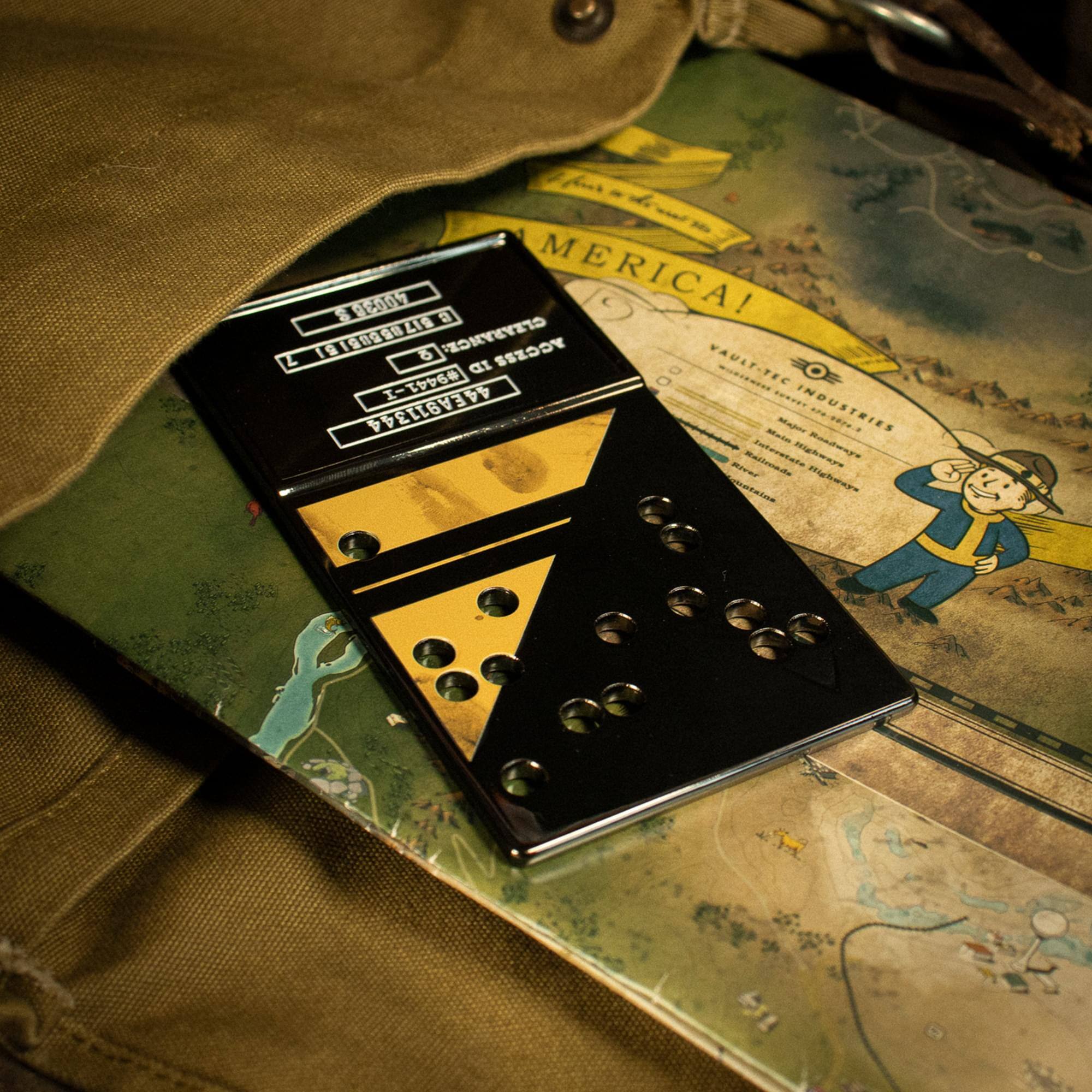"FEOL AMERICA!  
CLEARANCE: 19  
ACCESS 09441-I  
VAULT-TEC INDUSTRIES  
44EA911344  
Made Safety 707"