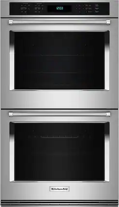 The text on the image reads "12:03 - - : . - 4 Sart Cancel 1 KitchenAid." This text is likely a time stamp or a message related to the oven. The correct text would be "12:03 - - : . - 4 Start Cancel 1 KitchenAid."