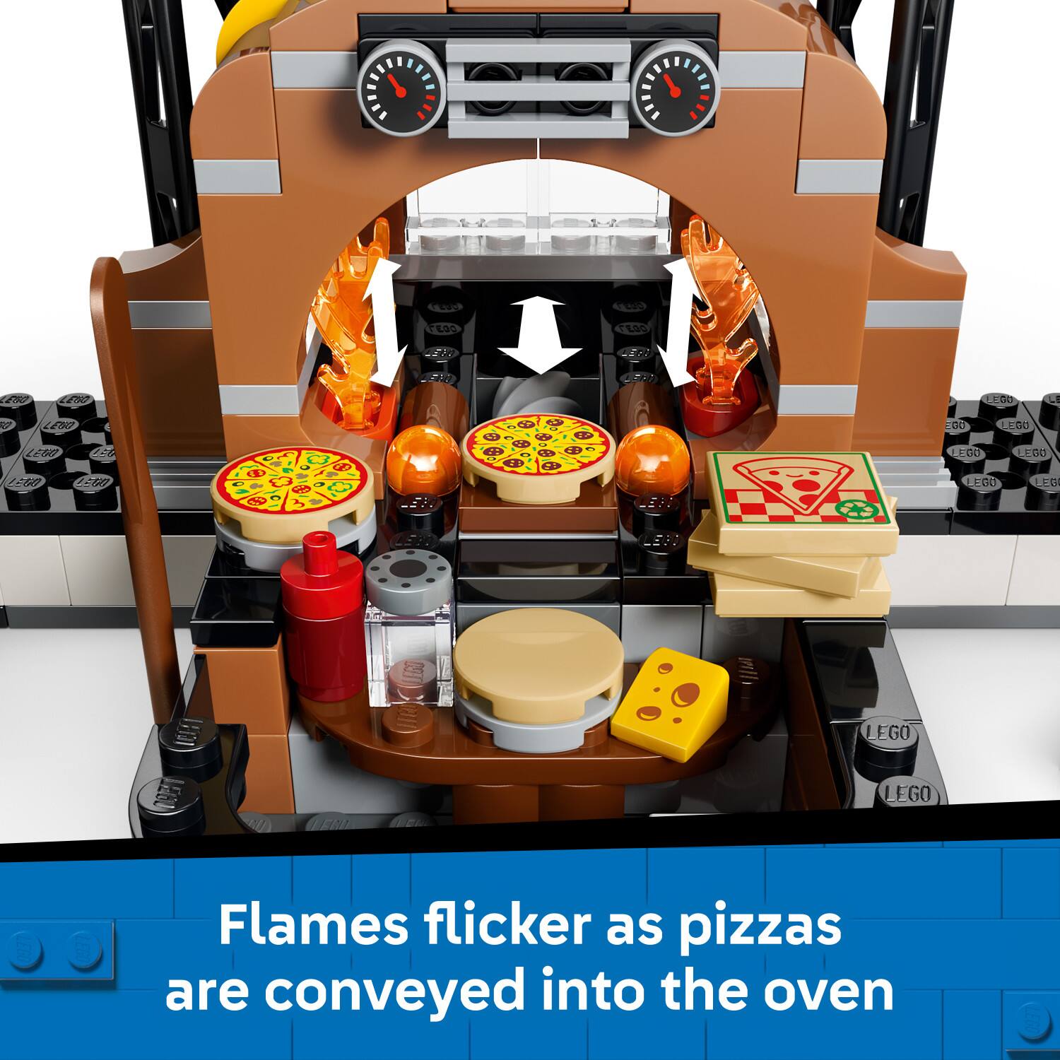 Flames flicker as pizzas are conveyed into the oven