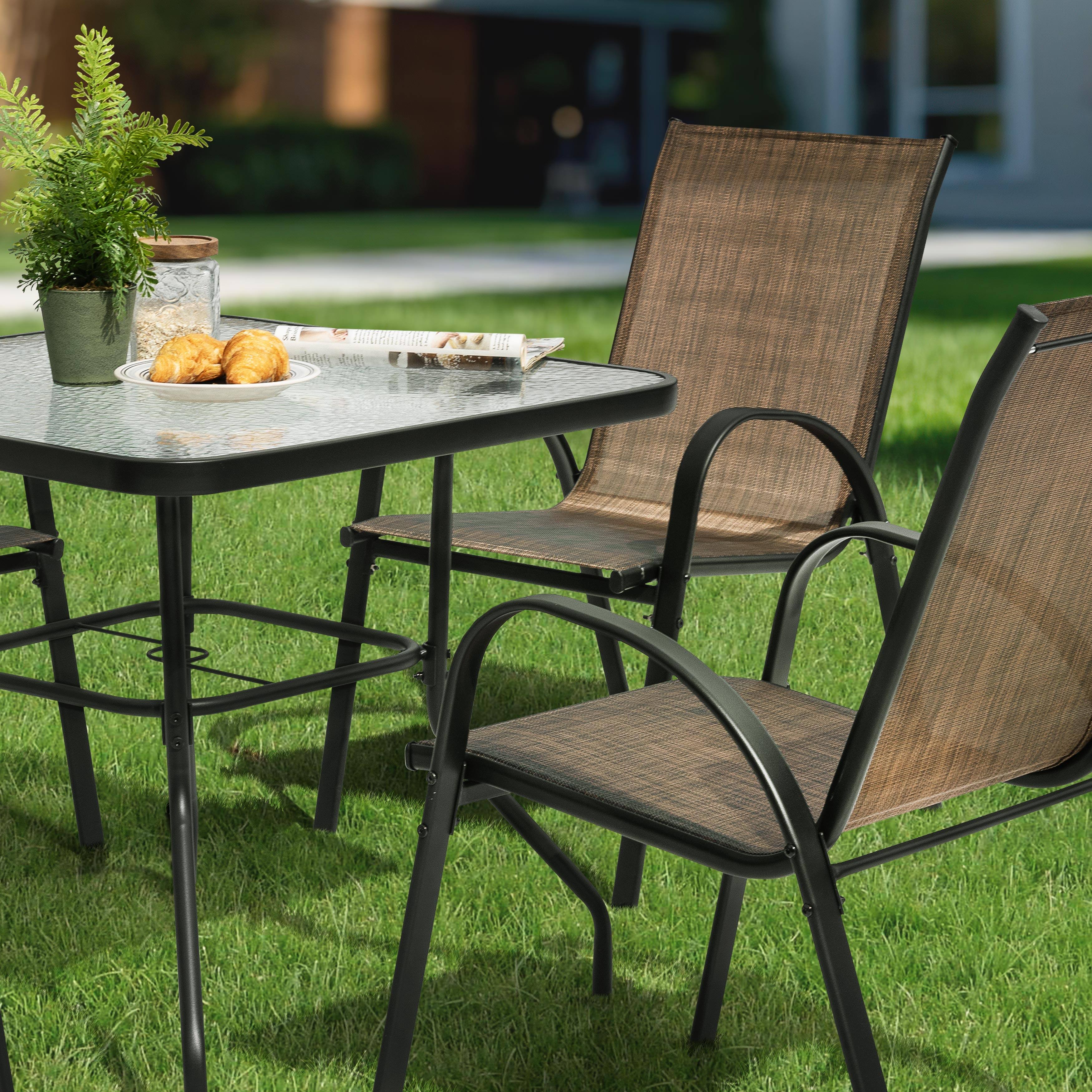 Angle. Nuu Garden - 5-Piece Metal and Textilene Square Outdoor Dining Set, 4 Stackable Chairs and Tempered Glass Table with Umbrella Hole - Brown and Transparent.