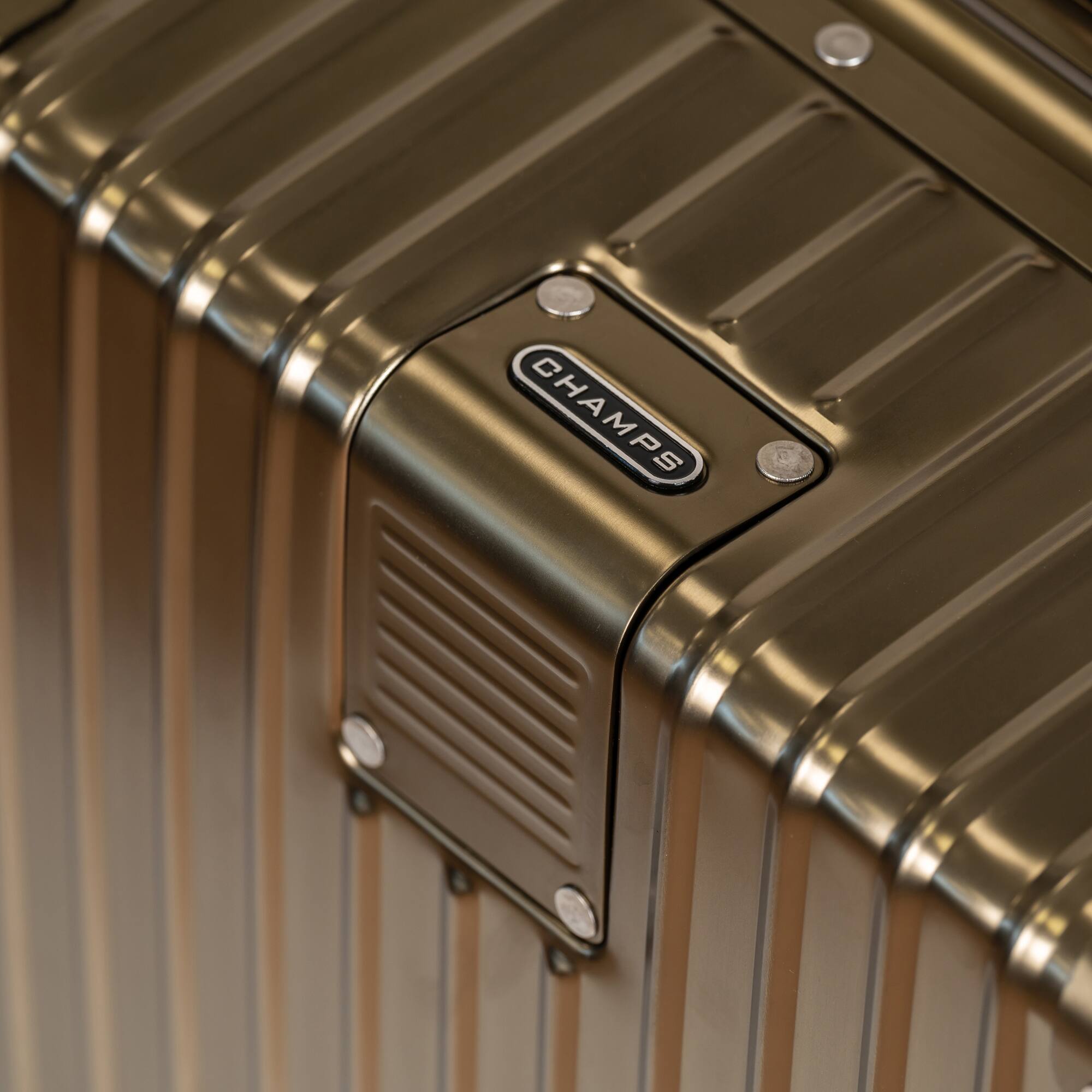 Left. Champs - Elite Aluminum Collection Carry-on Luggage Case - Titanium Gold.