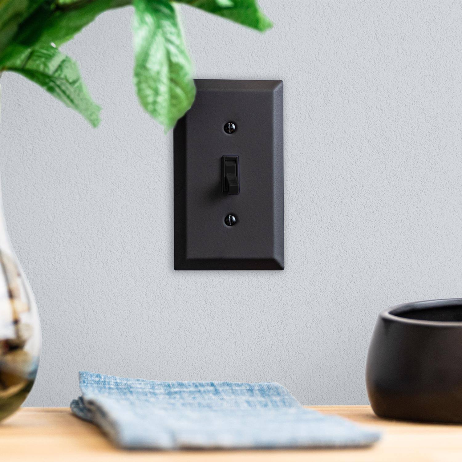 Angle. AMERELLE - Amerelle Century Matte Black 2 gang Stamped Steel Toggle Wall Plate 1 pk - Black.