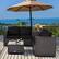 Alt View 4. Costway - 4 PCS Outdoor Patio Rattan Furniture Set Cushioned Loveseat Storage Table - Black.