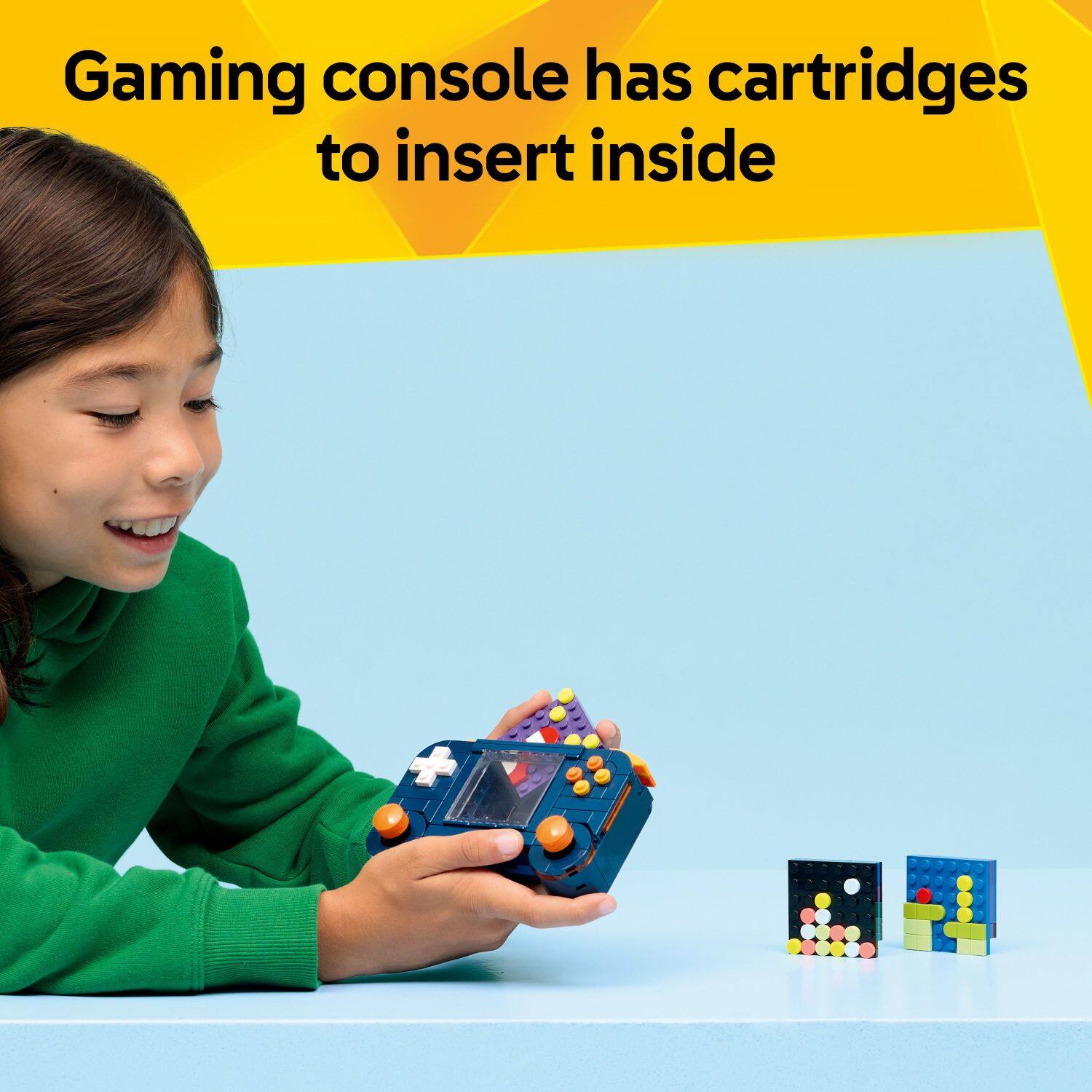 Gaming console has cartridges to insert inside