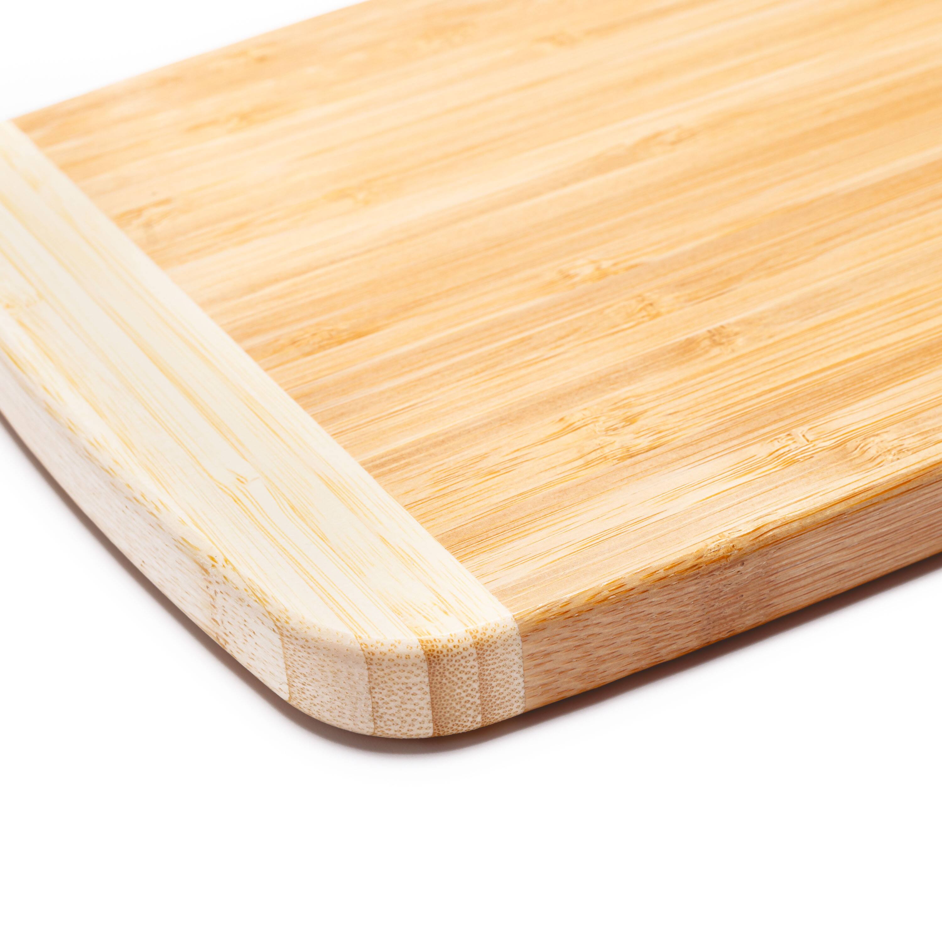 Angle. Escali - Joyce Chen Medium Burnished Bamboo Cutting Board, 8x12 Inches - Natural.