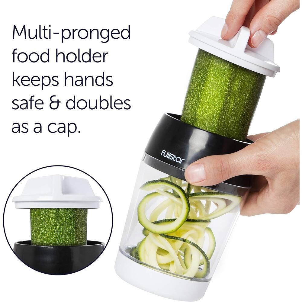 Multi-pronged food holder keeps hands safe & doubles as a cap.