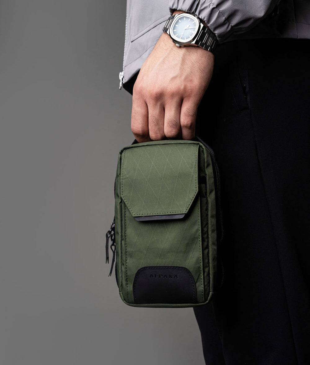Alt View 5. ALPAKA - Modular Sling V2 MIini Sling Bag for Phone, Magnetic Quick Access, EDC Crossbody Bag with Adjustable Strap - Dark Green X-Pac VX21.