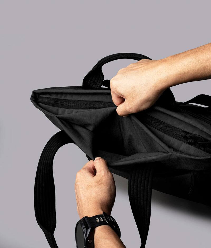 Alt View 7. ALPAKA - Flow Totepack Laptop Backpack for Men, 16" Laptop Compartment + 11" Tablet Sleeve, Tote/Backpack, Bottle Pocket - Black Axoflux 400D Washed Nylon.