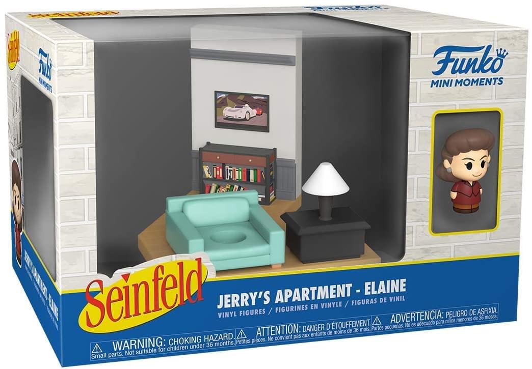 Sure, here is the corrected and grouped text from the image:

---

**Funko Mini Moments**

**Seinfeld**

**Jerry's Apartment - Elaine**

**Vinyl Figures / Figurines en Vinyle / Figurines de Vinil**

**WARNING: CHOKING HAZARD - Small parts. Not suitable for children under 36 months.**

**ADVERTENCIA: PELIGRO DE ASFIXIA. Partes pequeñas. No es adecuado para niños menores de 36 meses.**

**ATTENTION: DANGER D'ÉTOUFFEMENT. Petites pièces. Ne convient pas aux enfants de moins de 36 mois.**

---

This text is grouped and corrected for clarity.