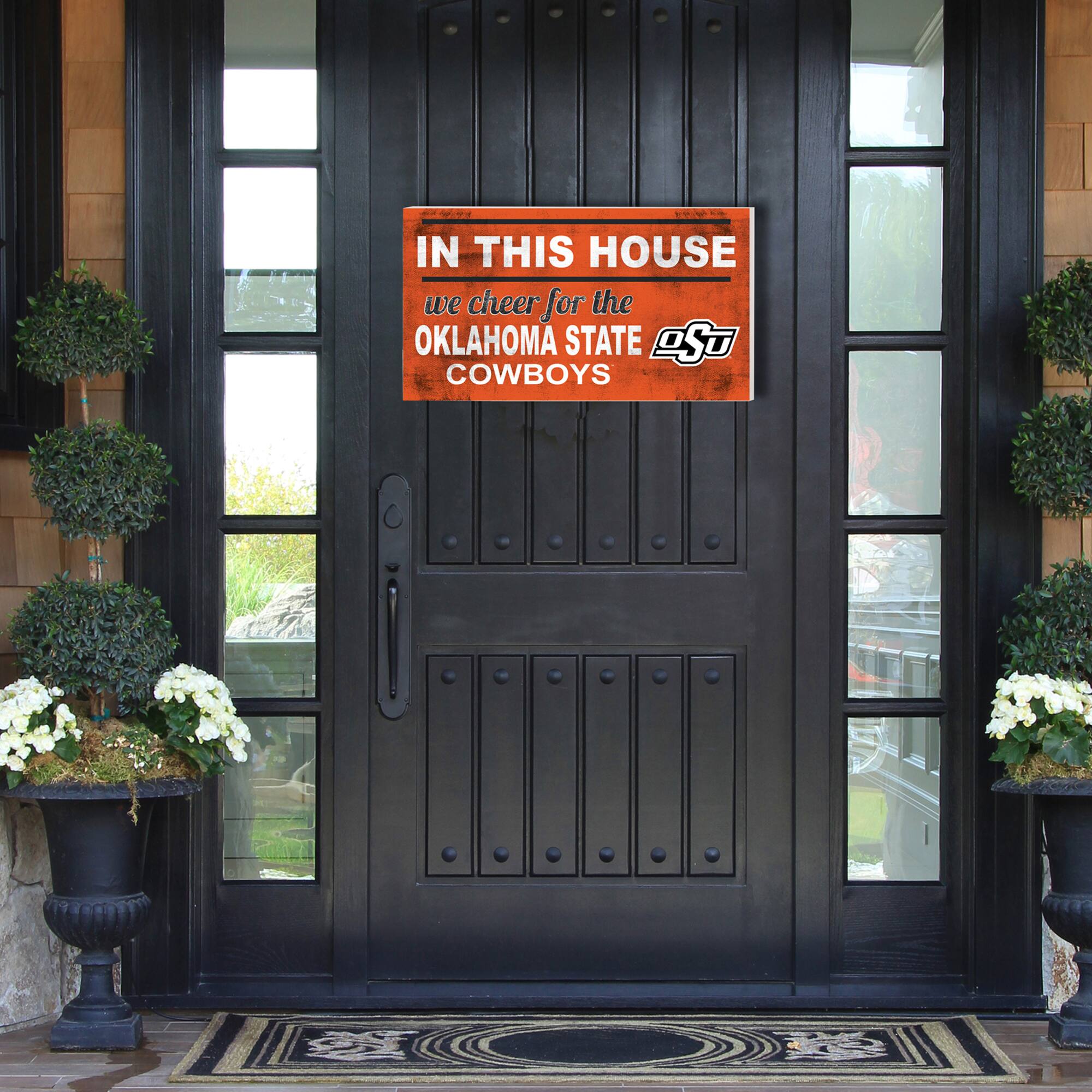 IN THIS HOUSE  
we cheer for the  
OKLAHOMA STATE  
COWBOYS