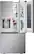 LG refrigerator with a water dispenser and ice dispenser. The fridge is filled with food and drinks, including bottles of water, juice, and milk. The refrigerator has a large freezer section and a water dispenser on the door.